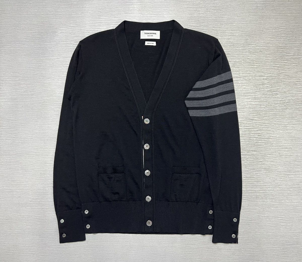 image of Thom Browne - Fine Merino Wool V-Neck 4-Bar Cardigan in Black, Men's (Size Medium)