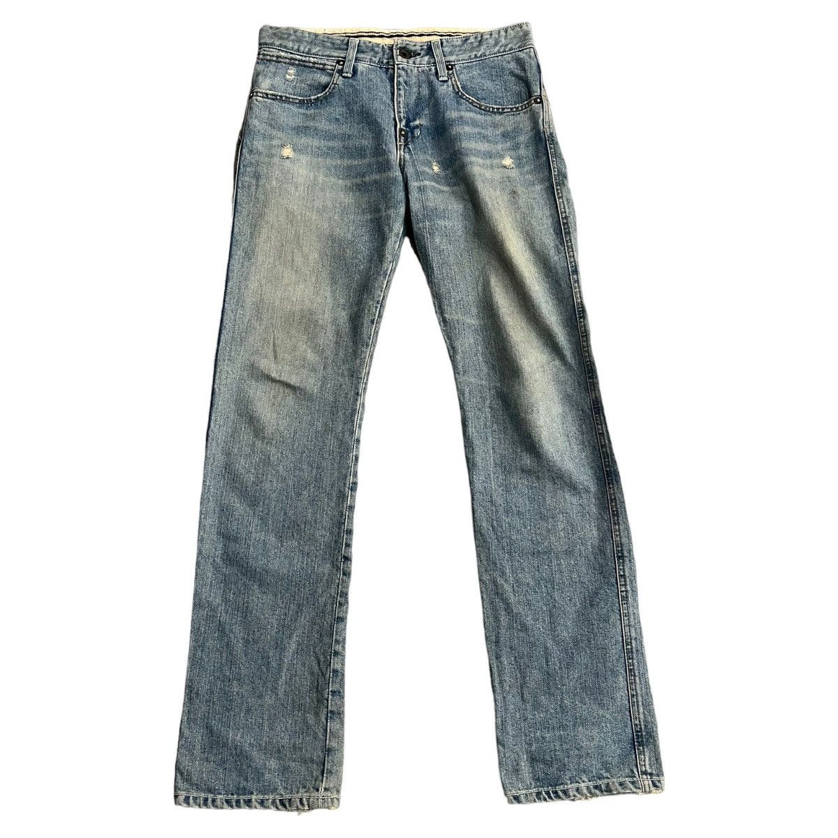 A pair of distressed Factotum Japanese Jeans in size 30 x 30