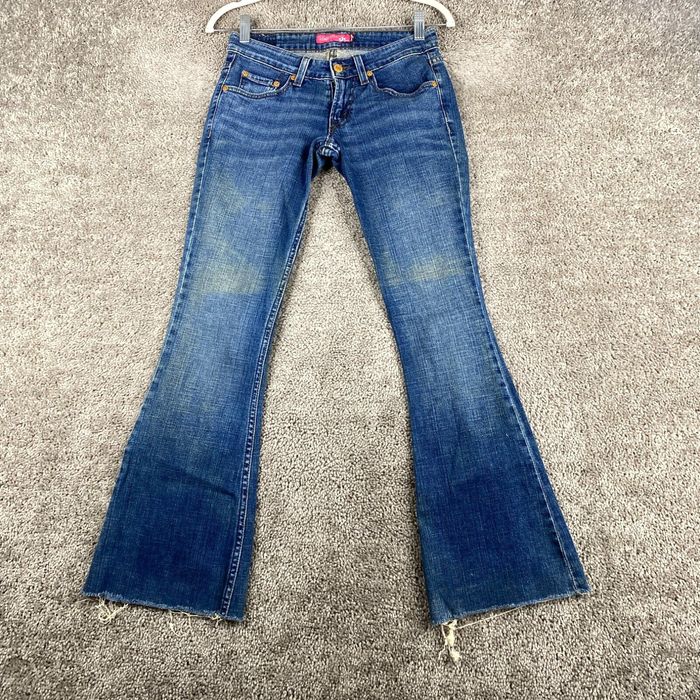 Levi's Levi's 524 Too Superlow Flared Jeans Women's Size 1M Blue Medium Wash  Raw Hem