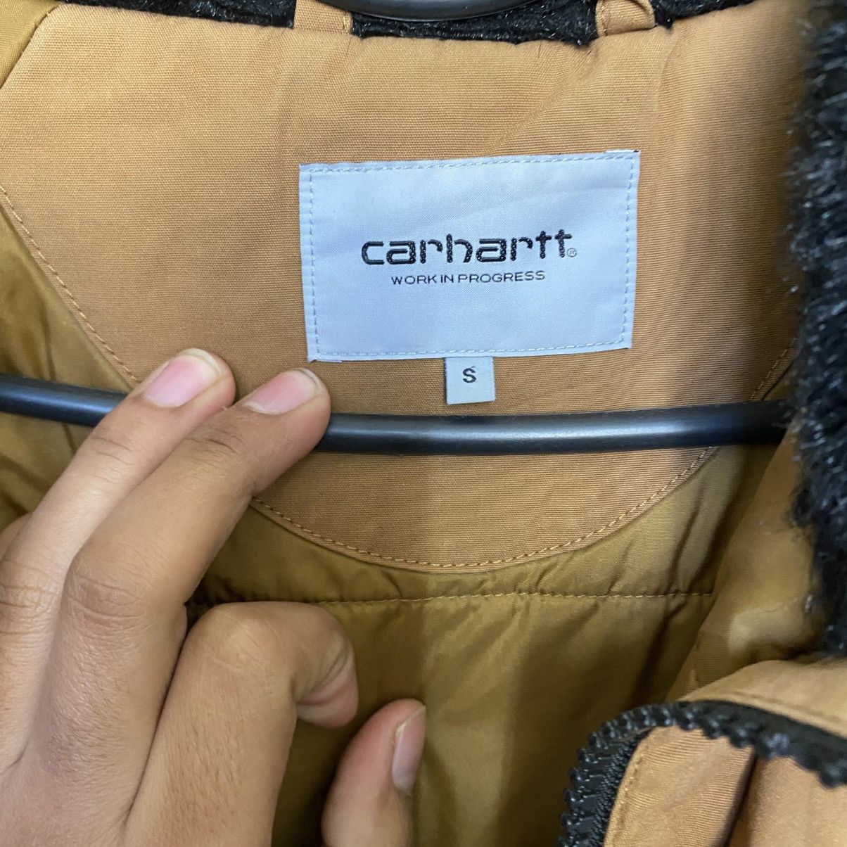Carhartt WIP Trapper Parka in a Hamilton Brown color