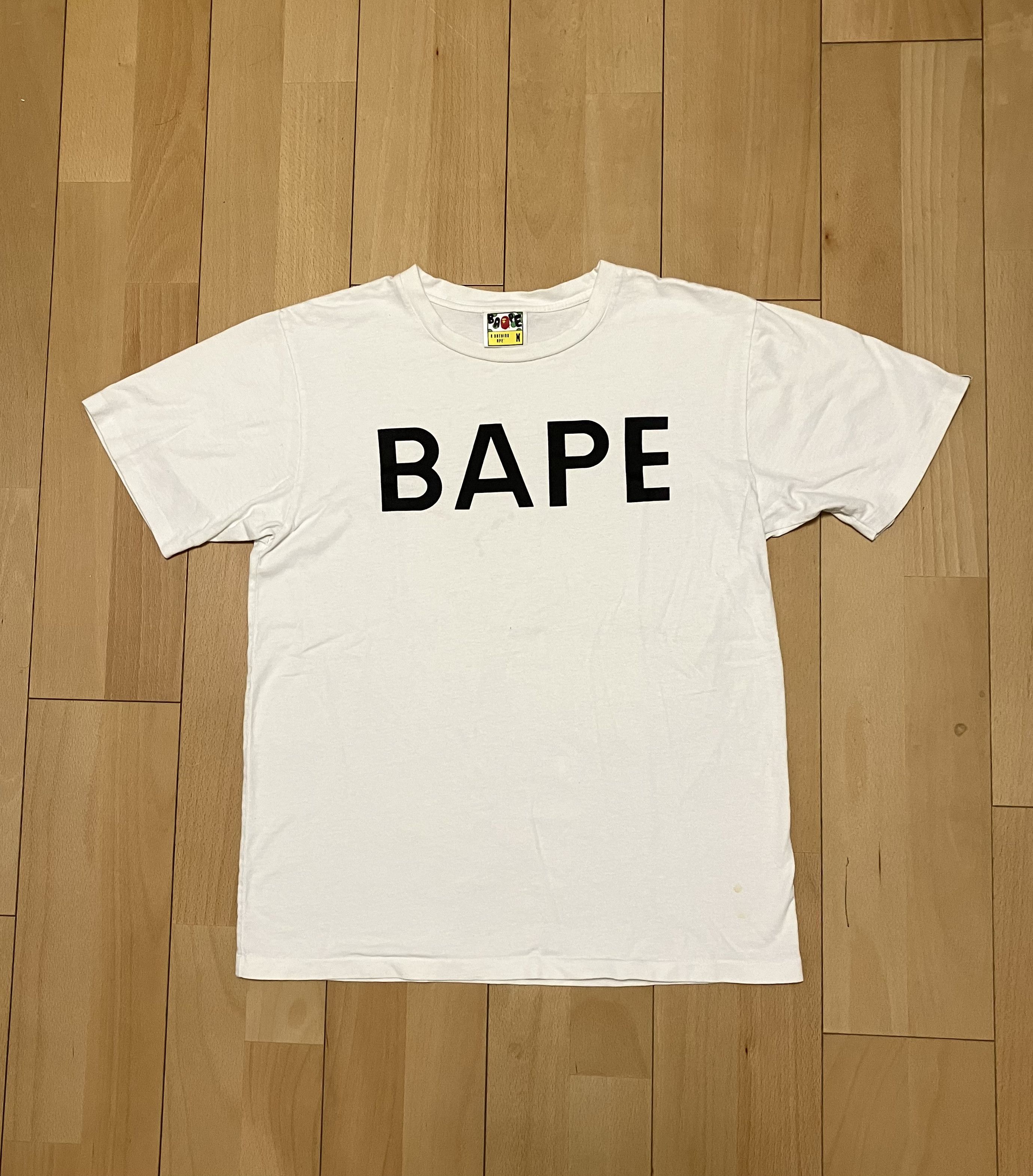 image of Bape White Spellout Logo Black Short Sleeve, Men's (Size Medium)