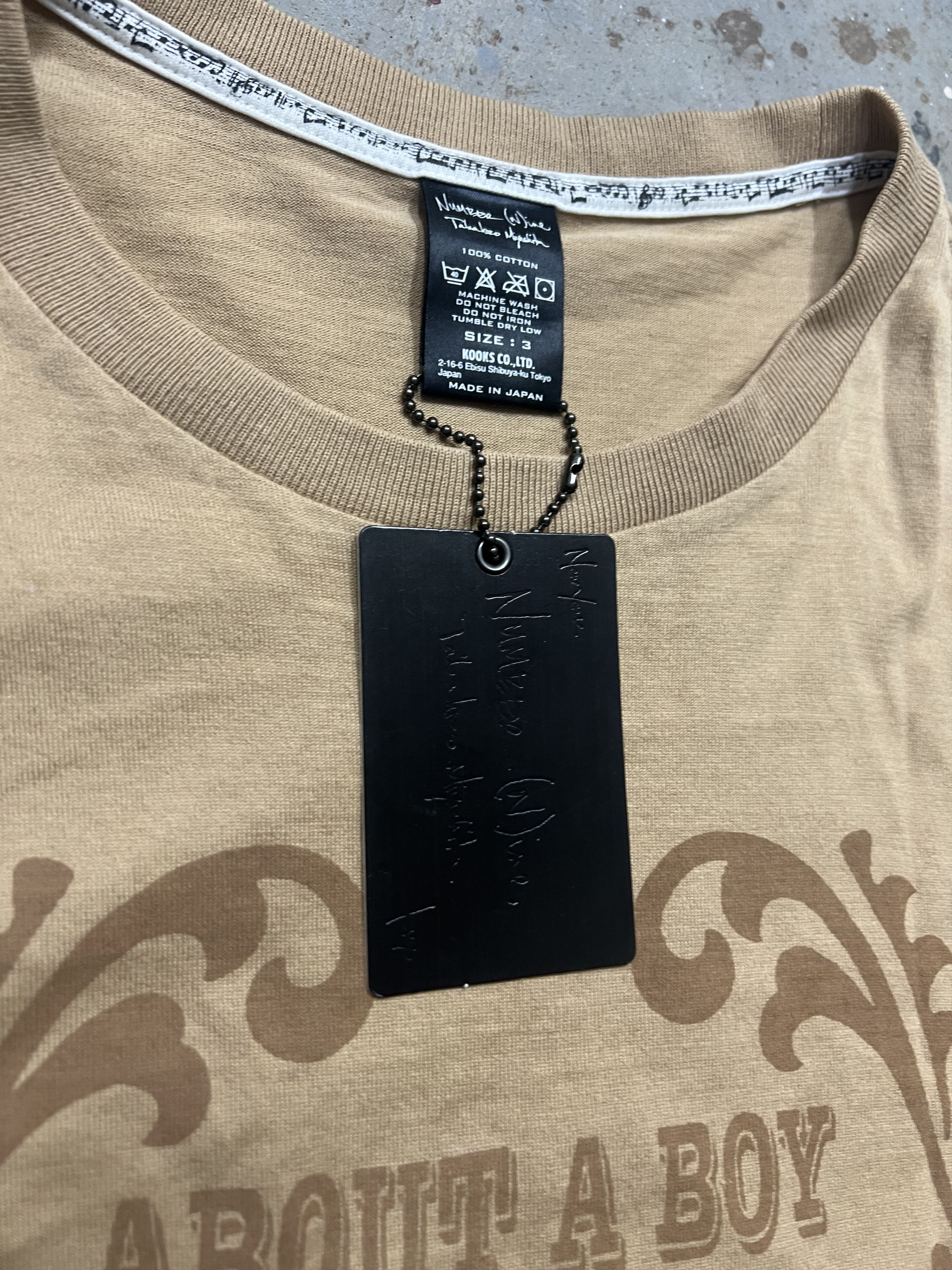 Number (N)ine Number (N)ine ss07 „about a boy” tee Size US L / EU 52-54 / 3 - 2 Thumbnail