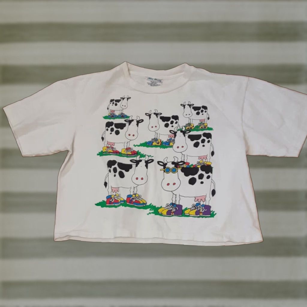 Vintage VINTAGE Woman Holstein Cows in Sneakers Halter/Half TShirt USA Single Stitch Free style One Size White Crew Neck Short Sleeve Mens Women Girls Boyss Size ONE SIZE - 1 Thumbnail