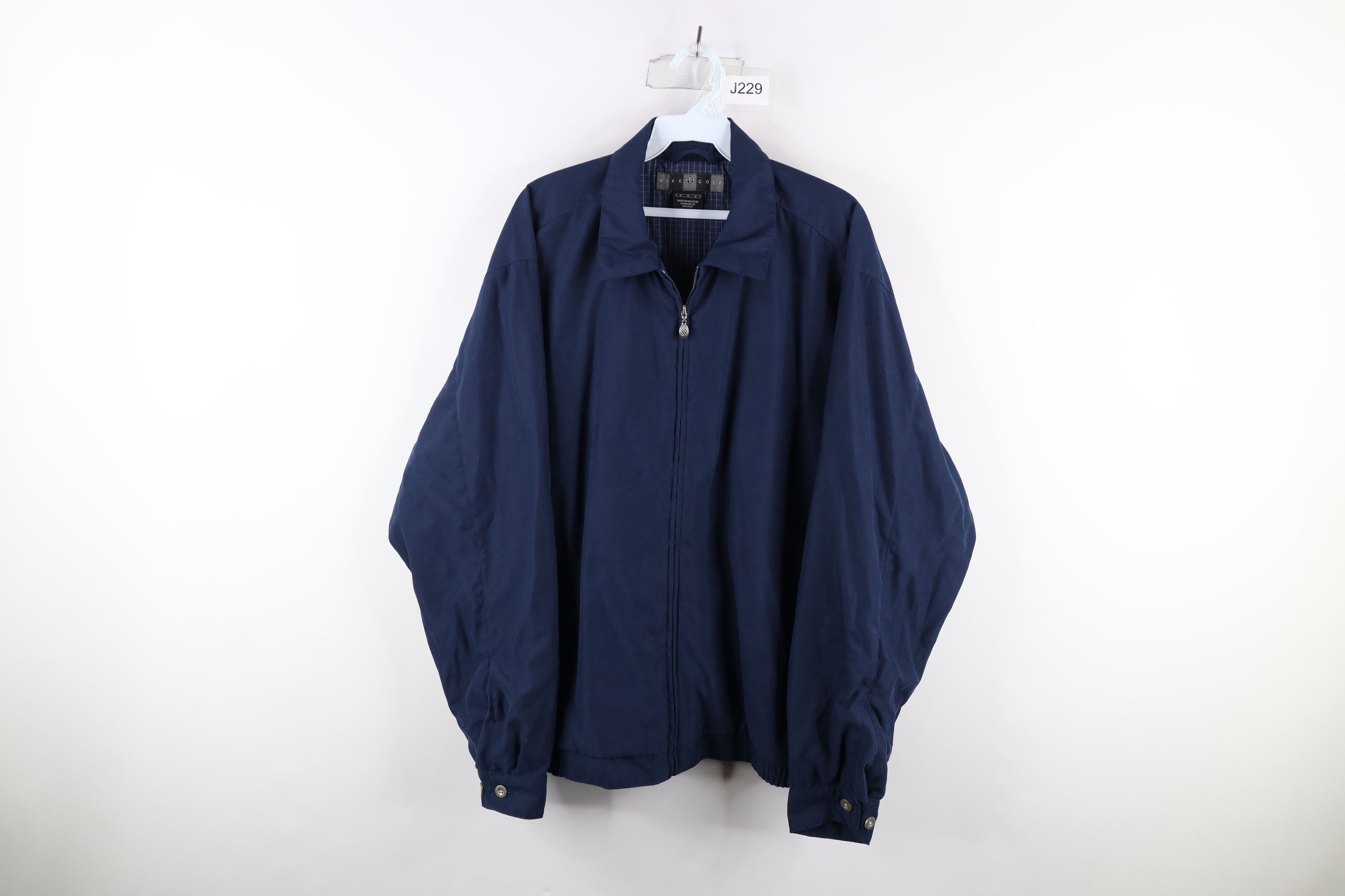 image of Nike Golf Scott Mini Swoosh Microfiber Bomber Jacket in Blue, Men's (Size Medium)