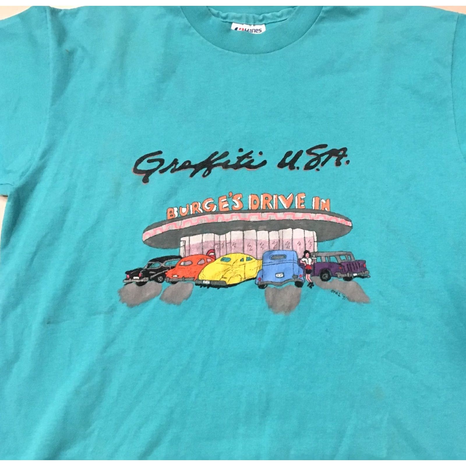Hanes VINTAGE Hanes Graphic Tee Turquoise 1990s 1990s Burge’s Drive In L Men's Short Sleeve Cotton Blend USA Printed Fifty Fifty Shirt Size US L / EU 52-54 / 3 - 7 Thumbnail