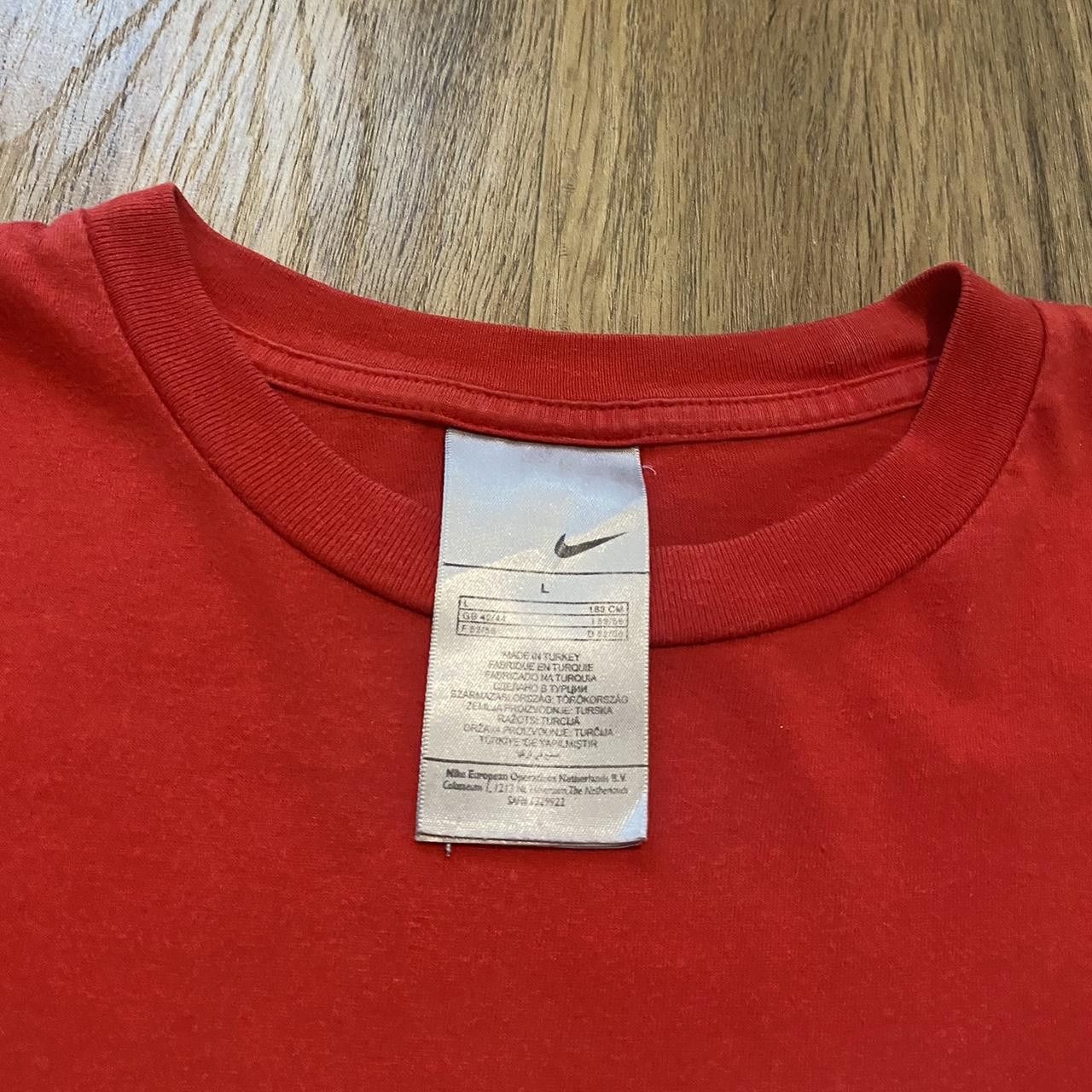 Nike 2000s y2k Red Nike graphic tee with a unique design Size US L / EU 52-54 / 3 - 5 Thumbnail