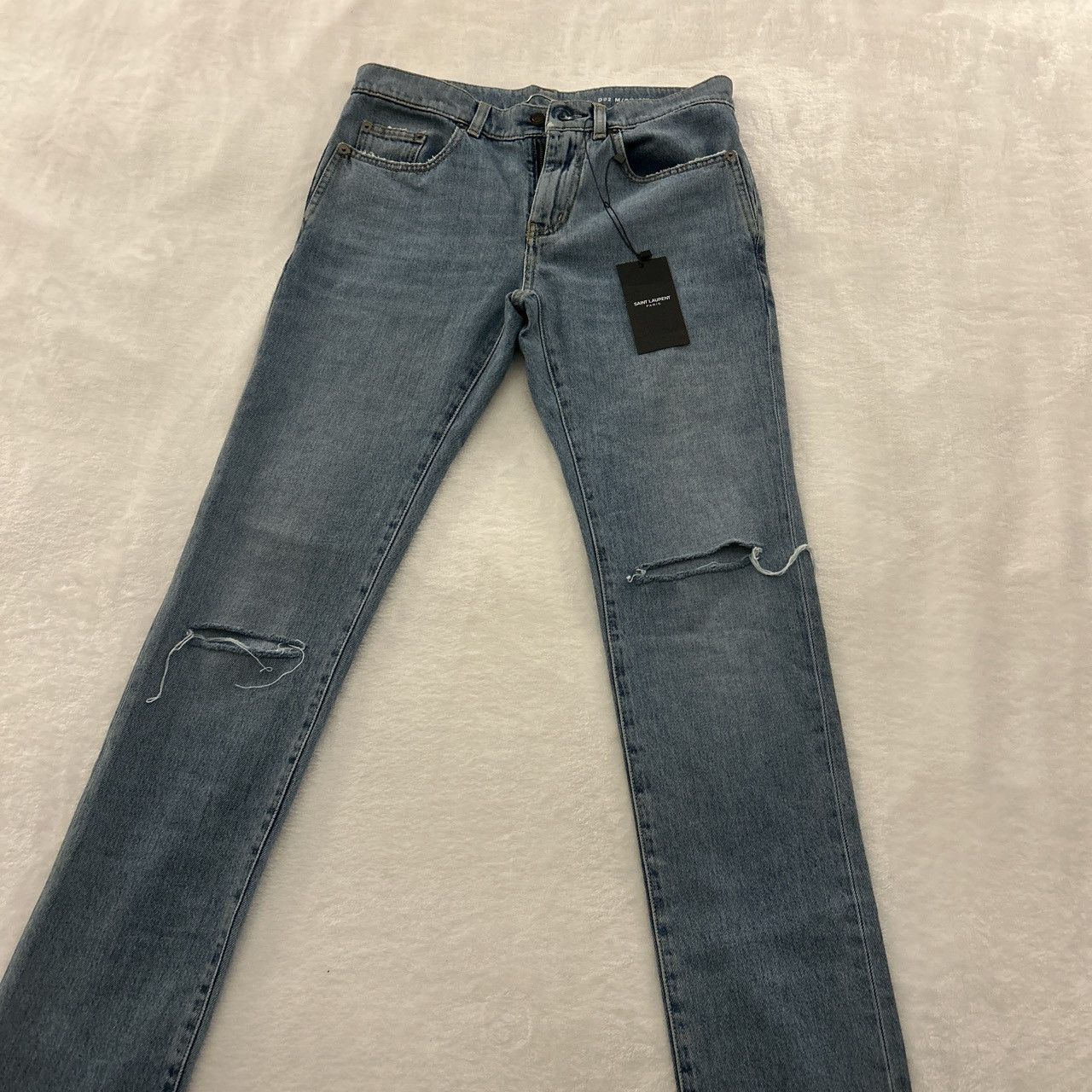 Saint Laurent Paris SLP D02 skinny ripped jeans | Grailed