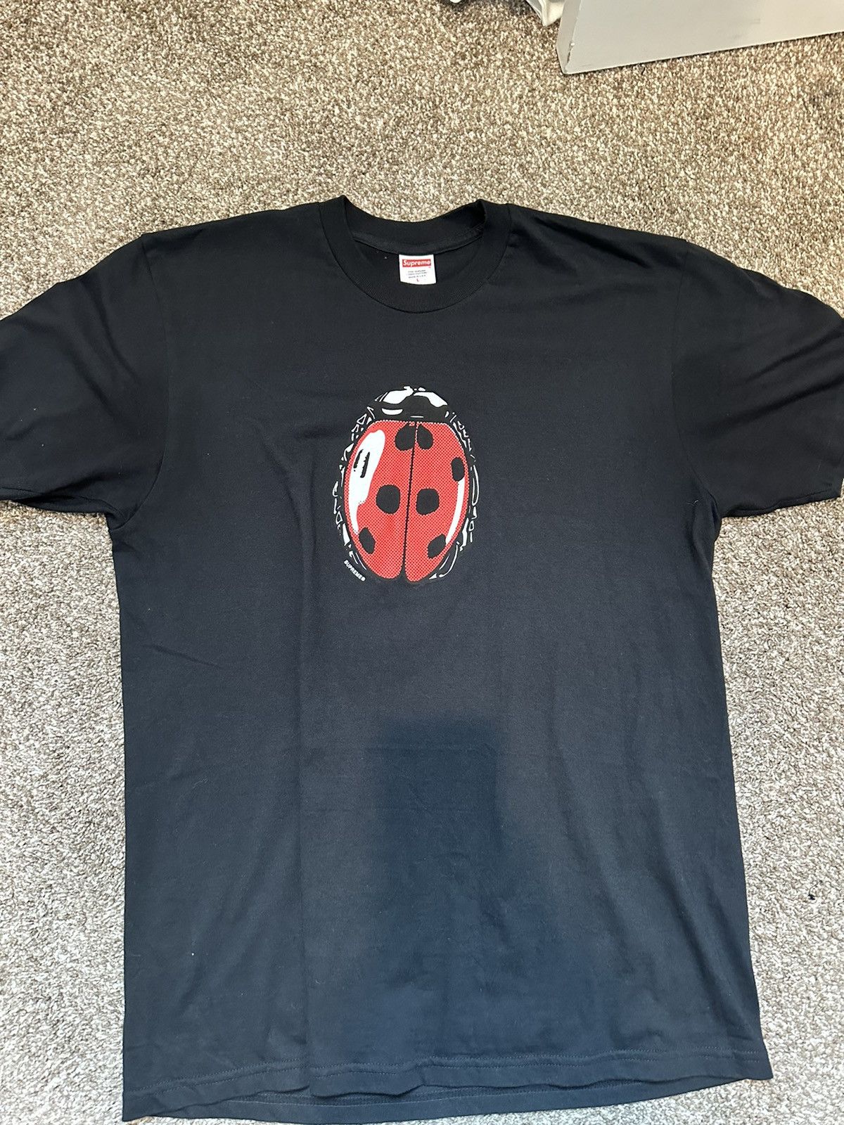 Supreme lady bug tee online