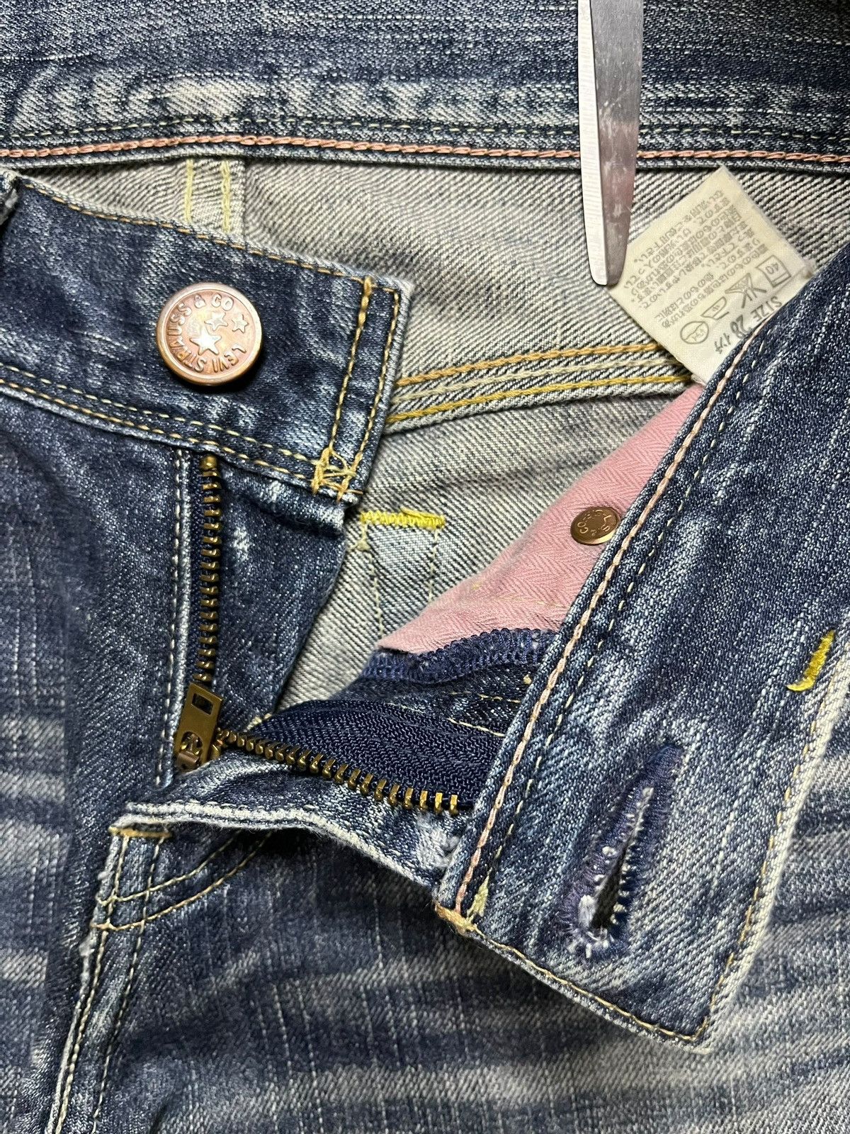 Vintage 90s Levis Star Faded Wash Distressed Flare Jeans