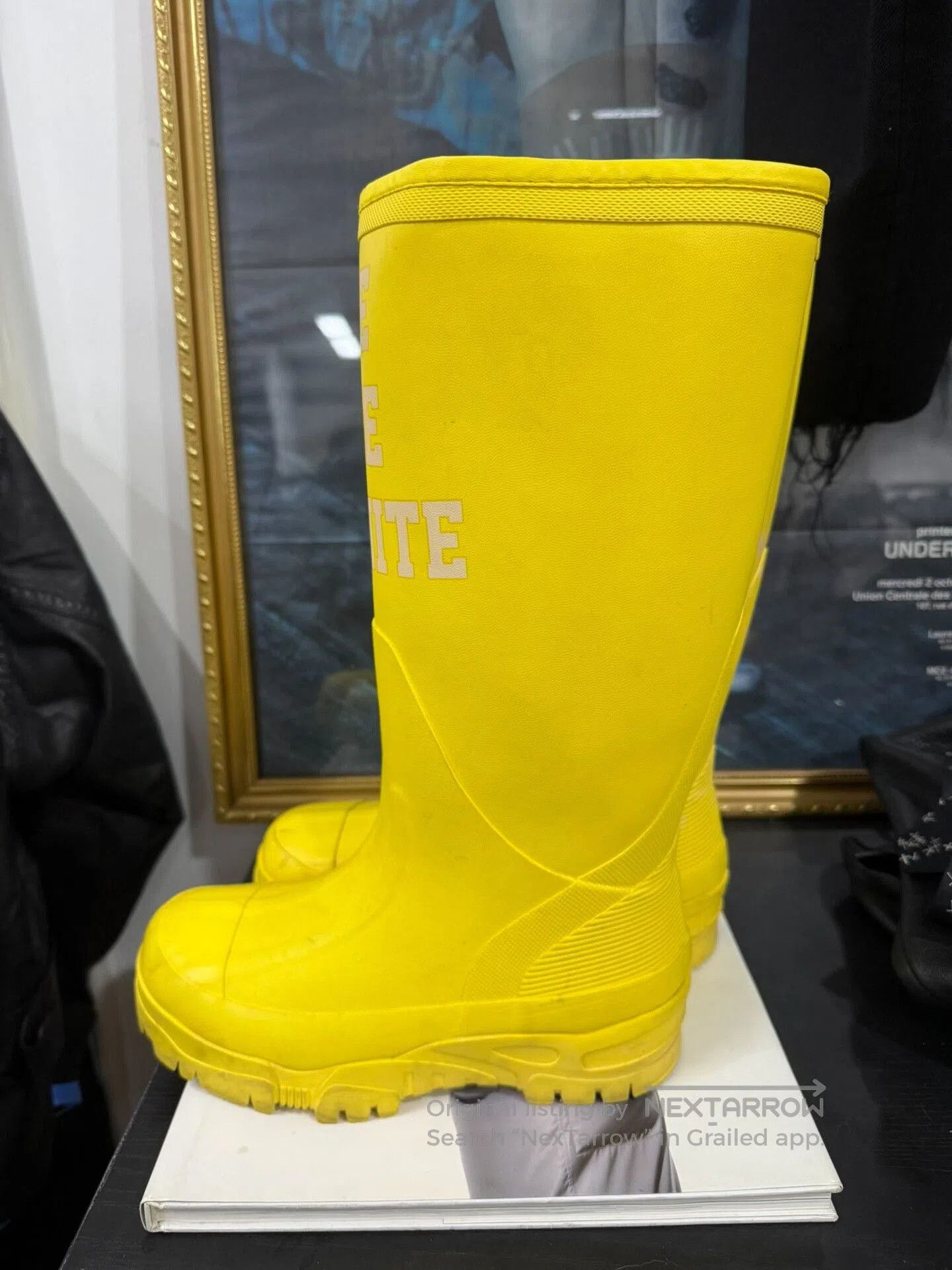 undercover we are infinite rain boots.