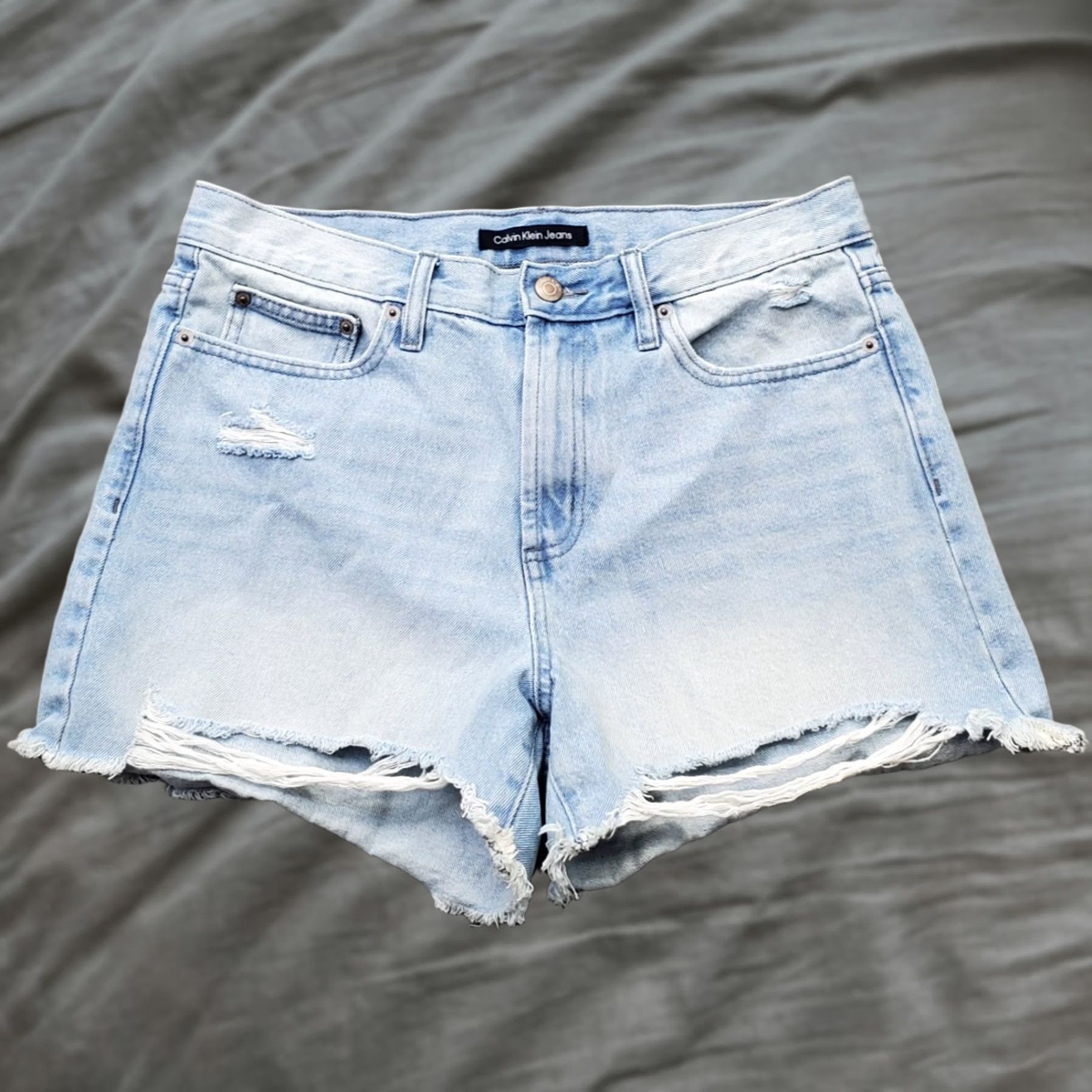 Calvin Klein Calvin Klein Jeans Cut-Off Shorts Womens 8 Blue Light Wash High Rise Raw Hem 5-Pocket Denim Casual Womens Size 8 Redundant not included Size 30" / US 8 / IT 44 - 1 Thumbnail