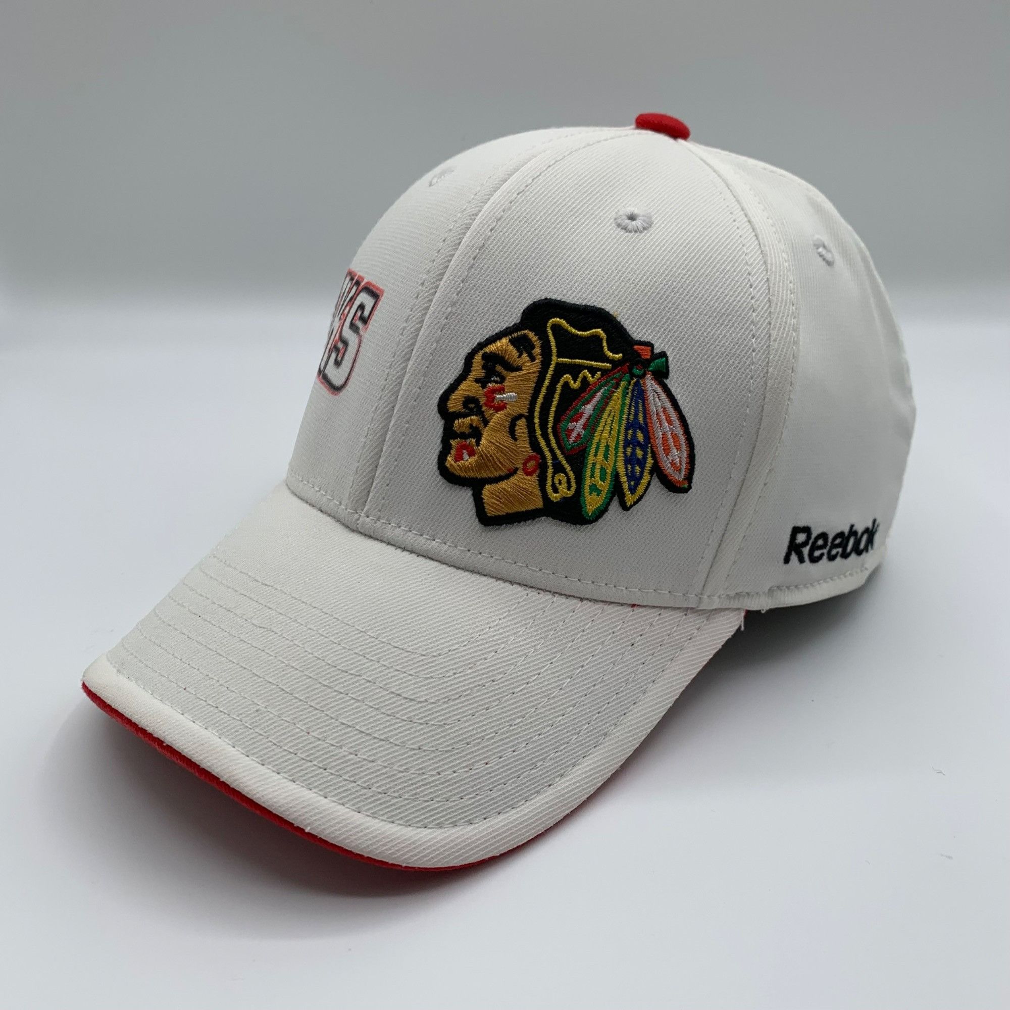Reebok Chicago Blackhawks Reebok Center Ice Stretch Fitted Hat L/XL ...