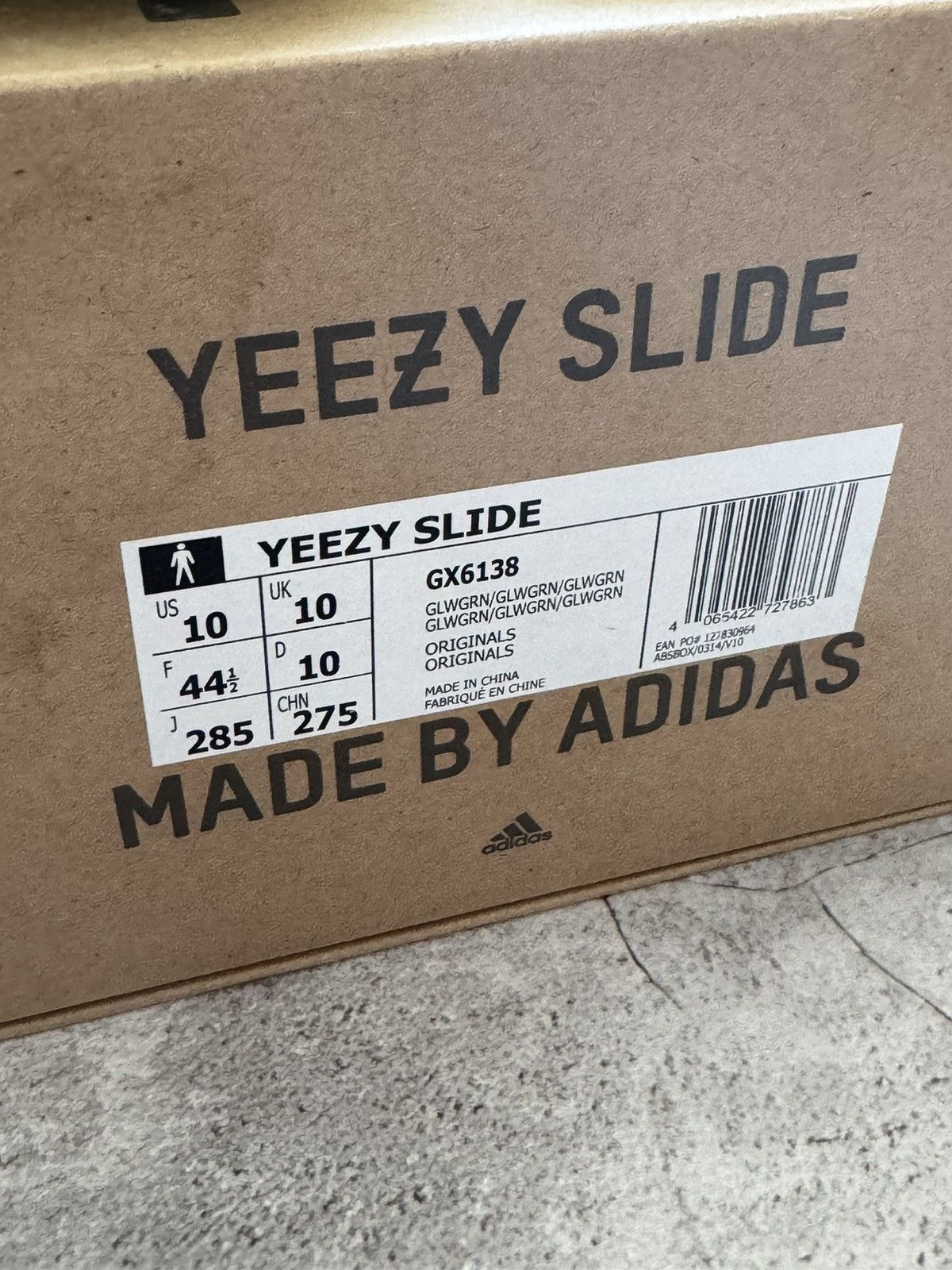 Adidas  Kanye West Yeezy slide Glow Green 10 us brand new | Grailed