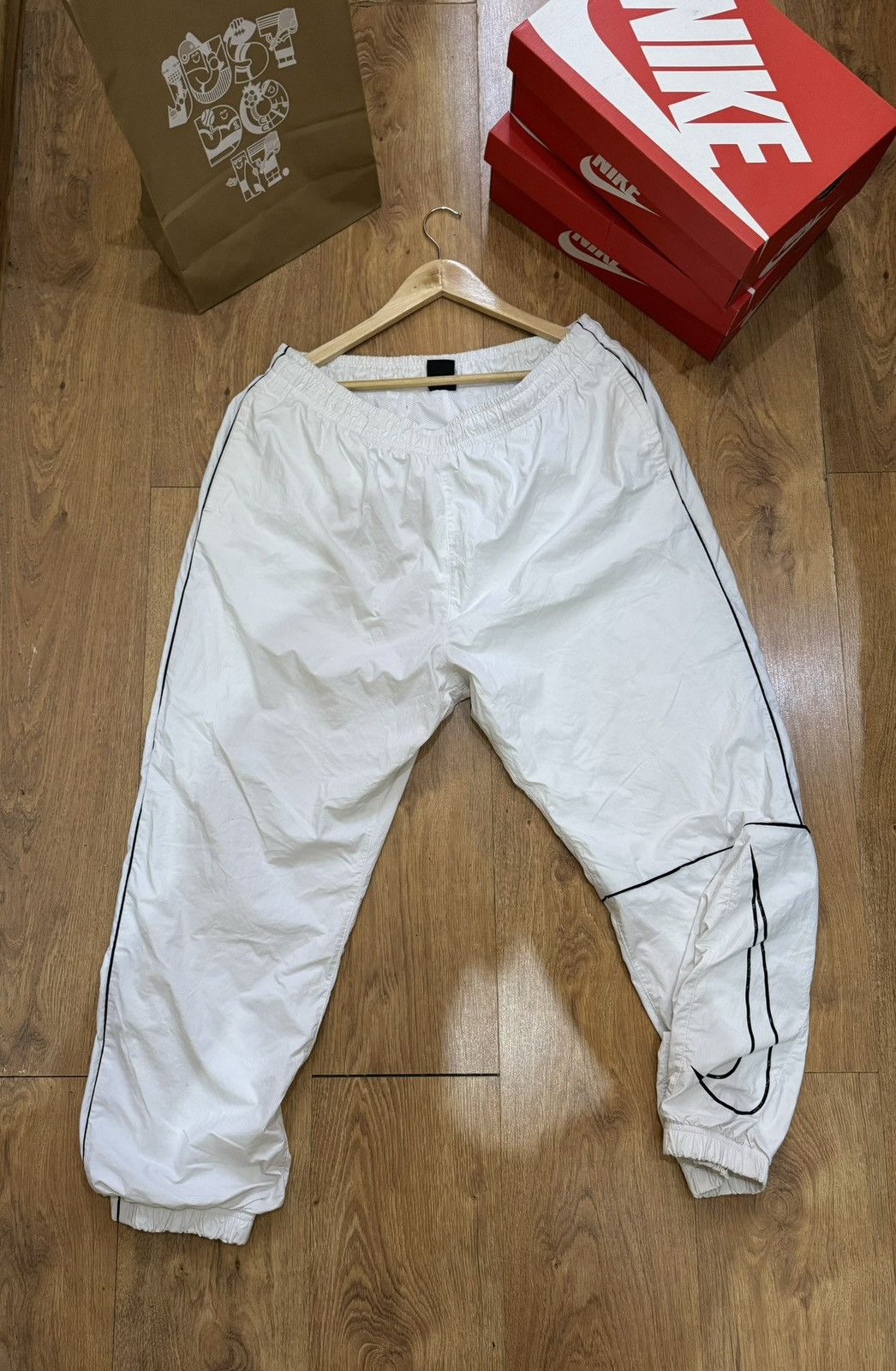 Nike sb track pants white best sale