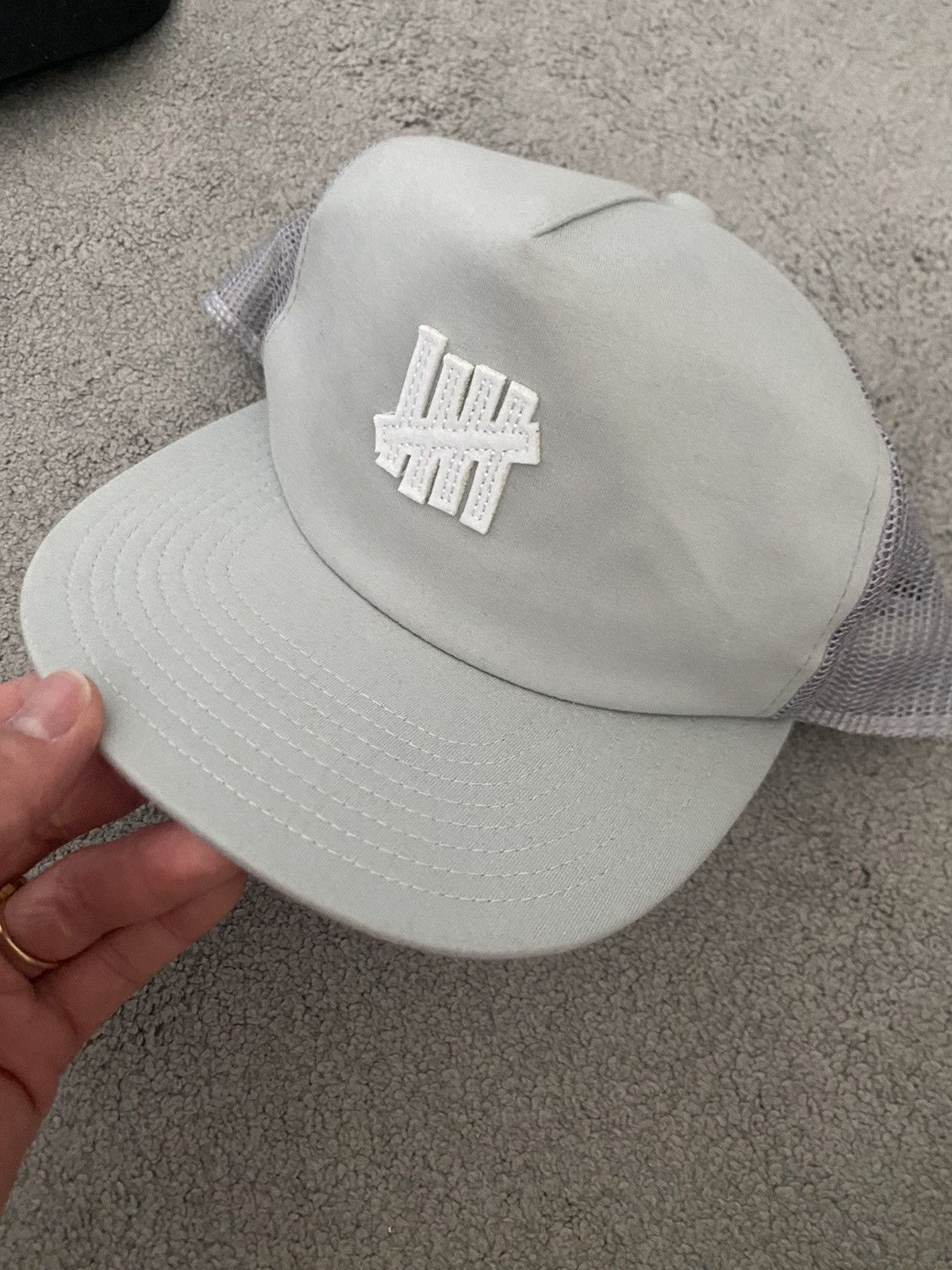 Undefeated best sale cap price