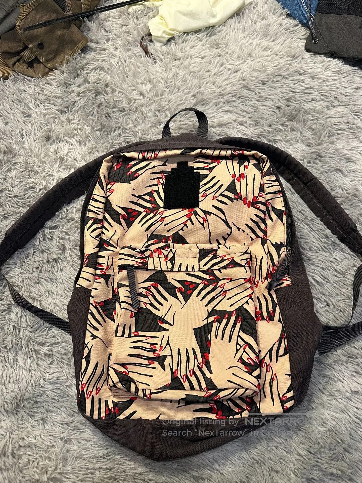 C.E/CAVEMPT Palm Print Backpack.
