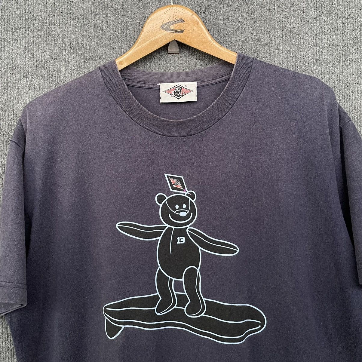 Vintage Vintage 1990s Bear Surfboard Sunfades T Shirt Size US XL / EU 56 / 4 - 2 Thumbnail