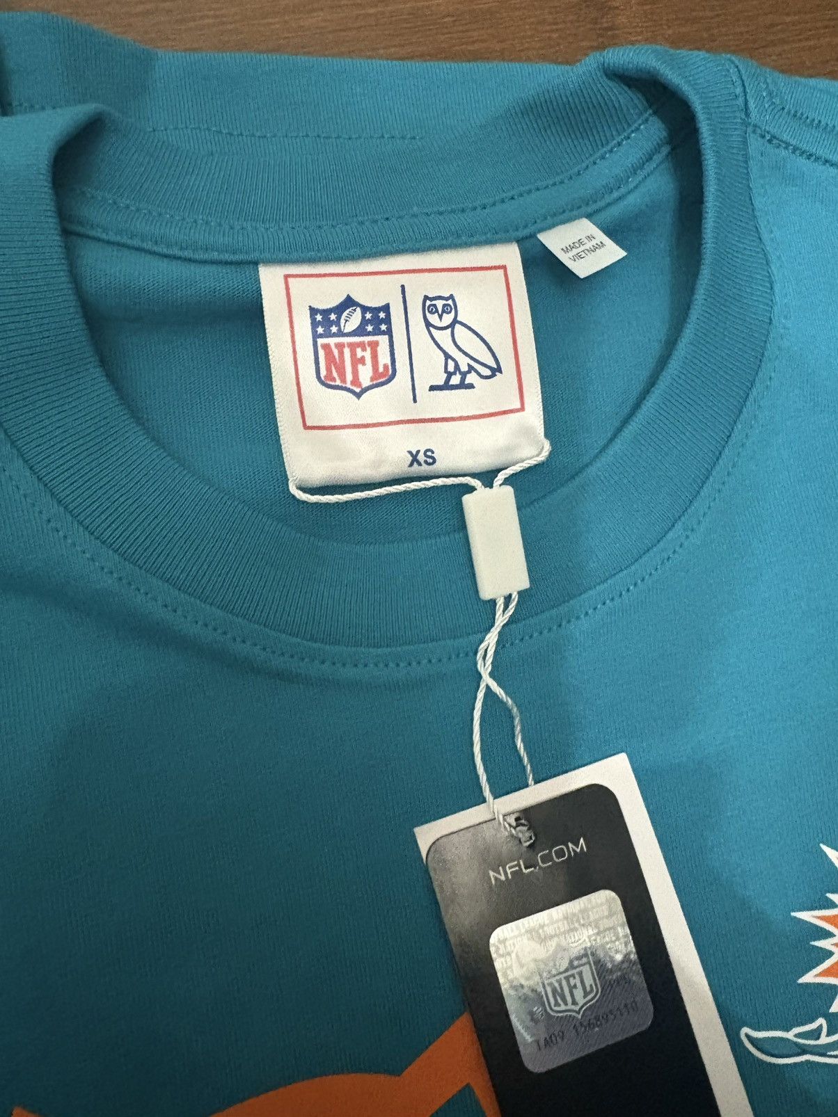 NFL × October's Very Own OVO Miami Dolphins Tee Size US XS / EU 42 / 0 - 4 Thumbnail