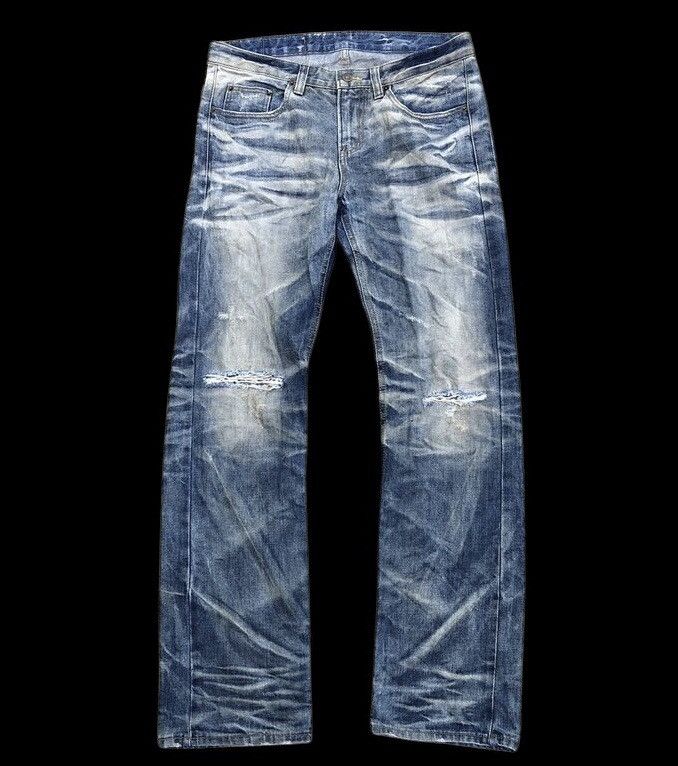 WASHED BLUE DISTRESSED 4CHA1 JEANS