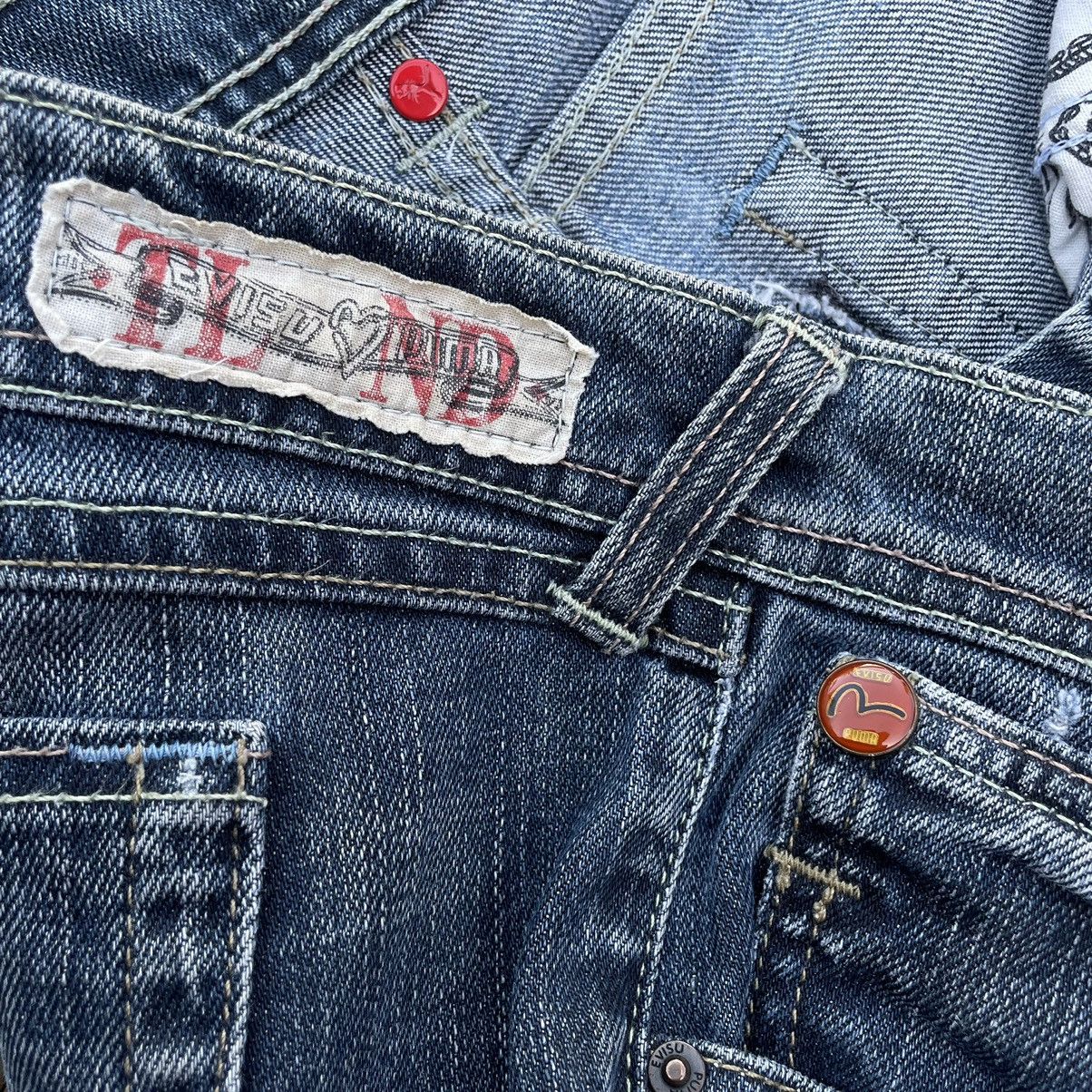 VINTAGE Y2K EVISU X PUMA DISTRESSED WASHED DENIM PANTS