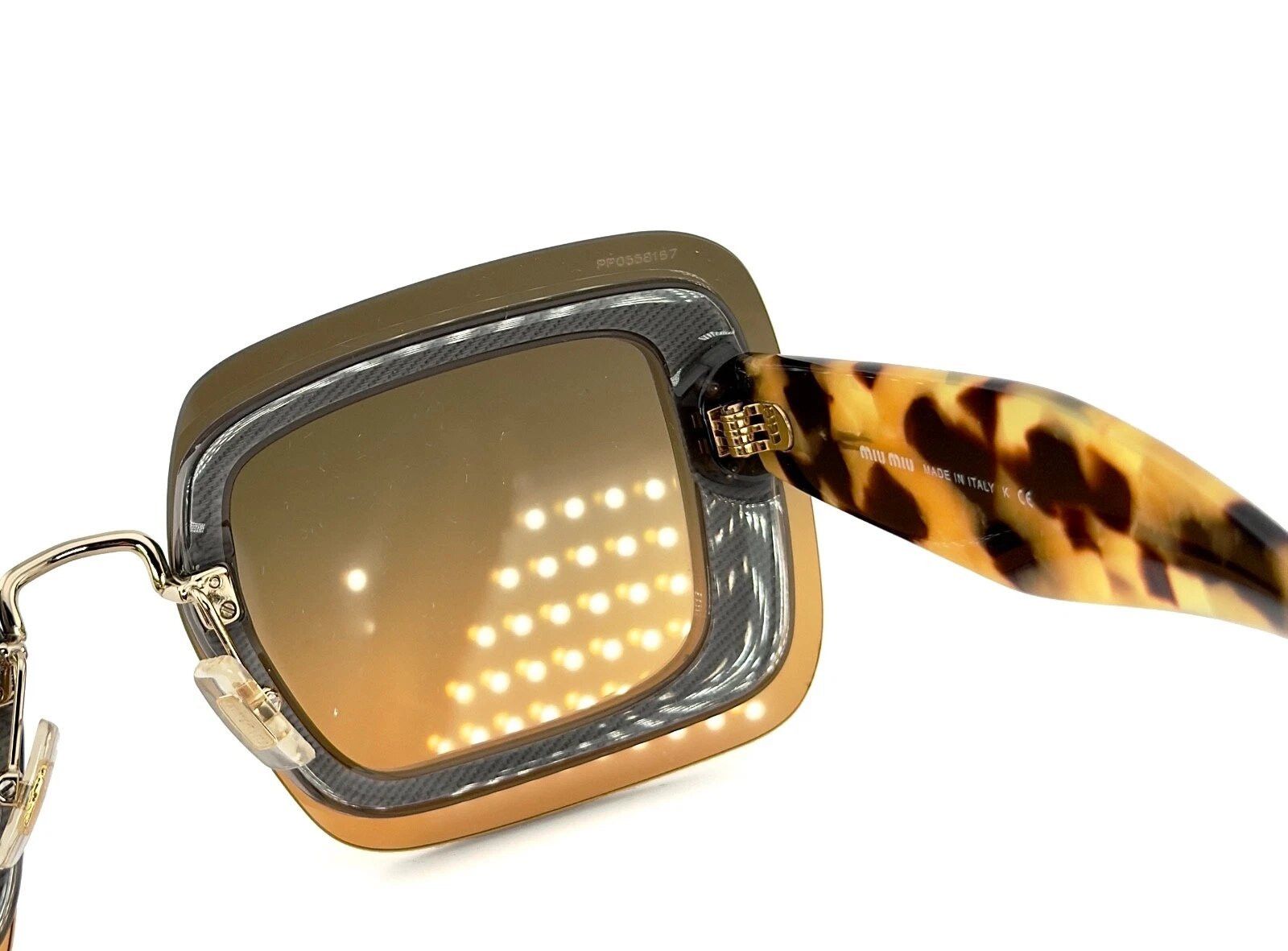 Miu Miu MIU MIU REVEAL 01RS MU01RS Orange Fashion Sunglasses 01R Size ONE SIZE - 8 Thumbnail
