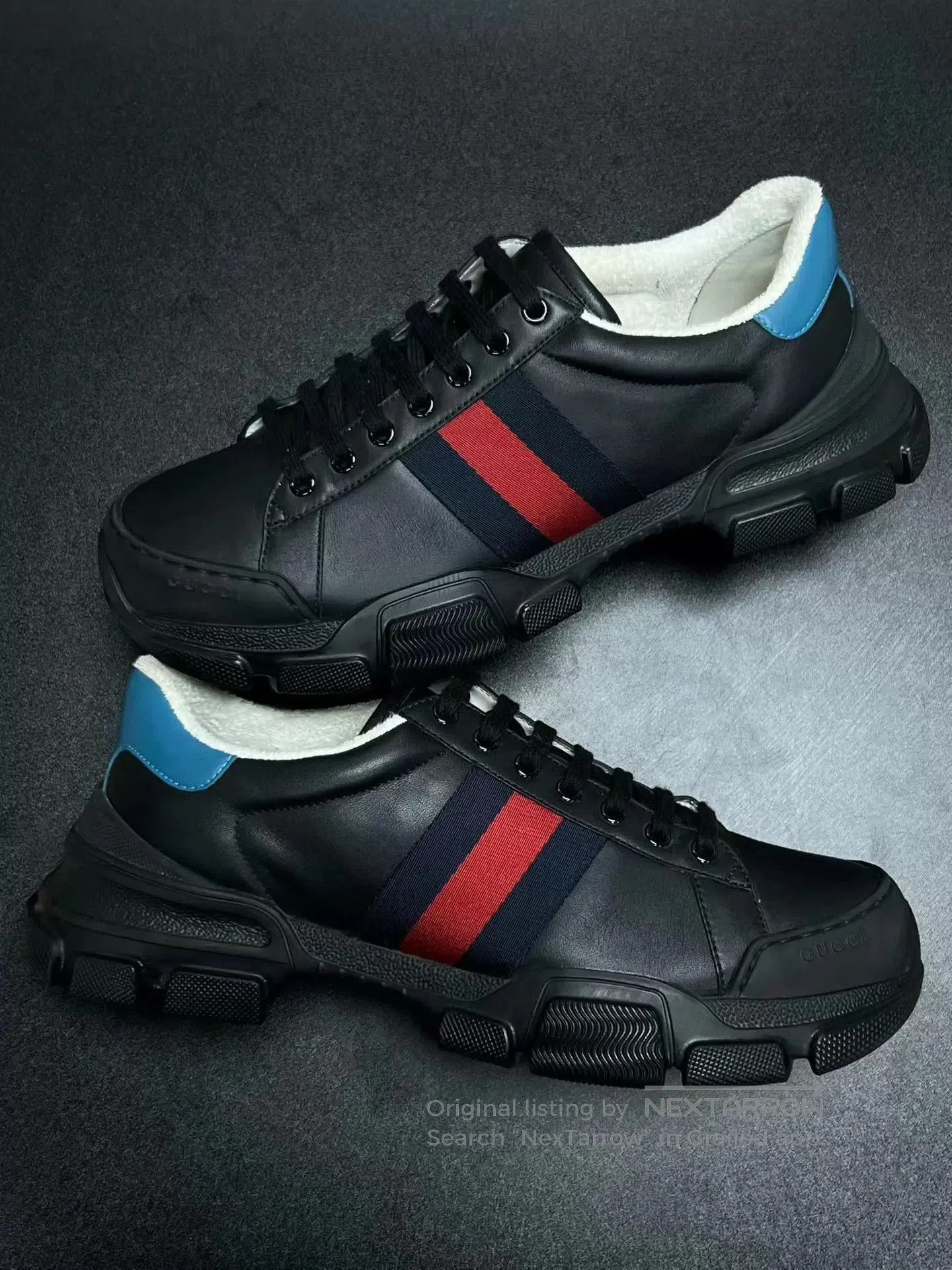 Black Low-Top Sneakers with Red and Blue Stripes.