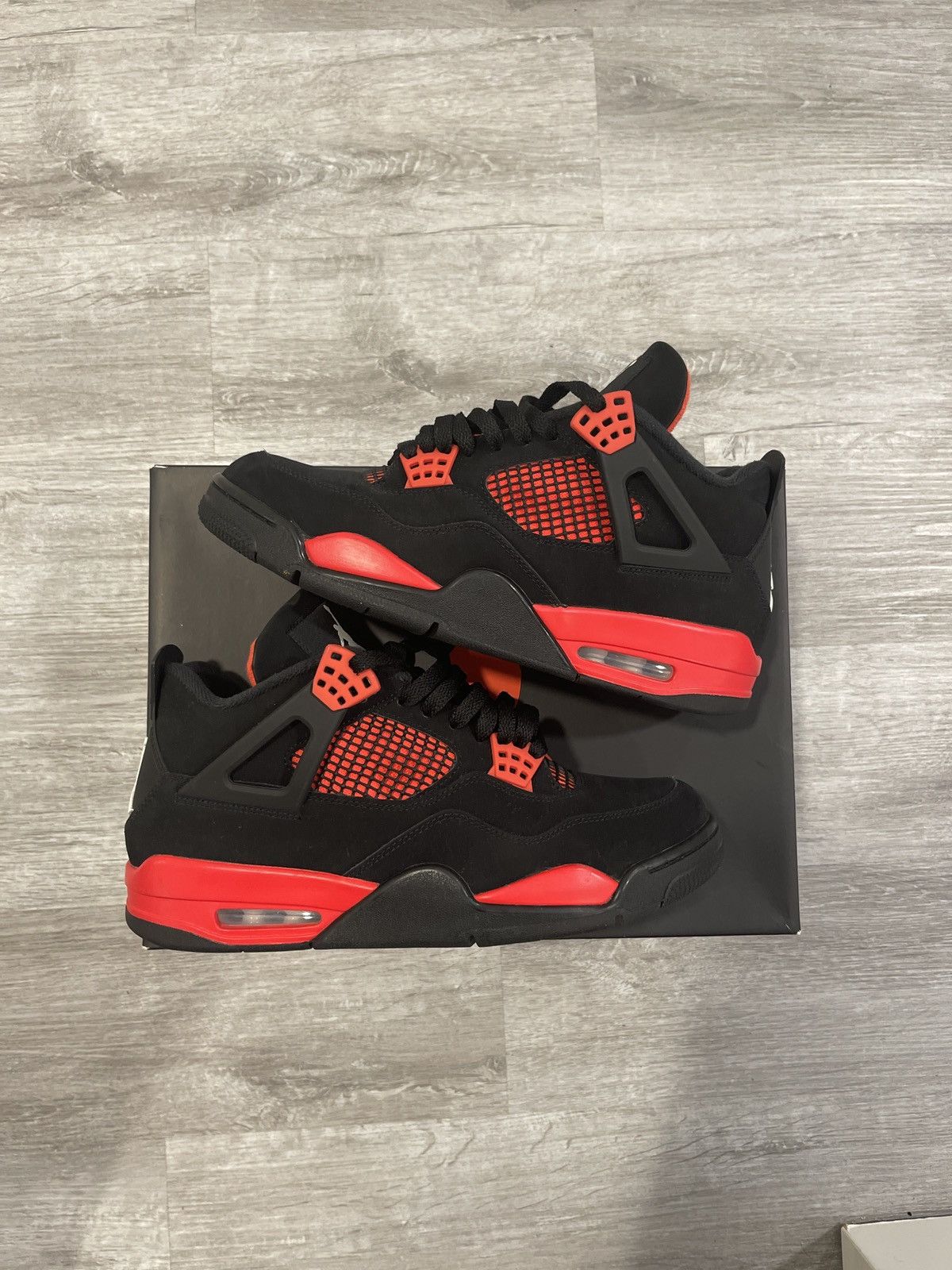 image of Nike Jordan 4 Shoes in Black/Red, Men's (Size 10)