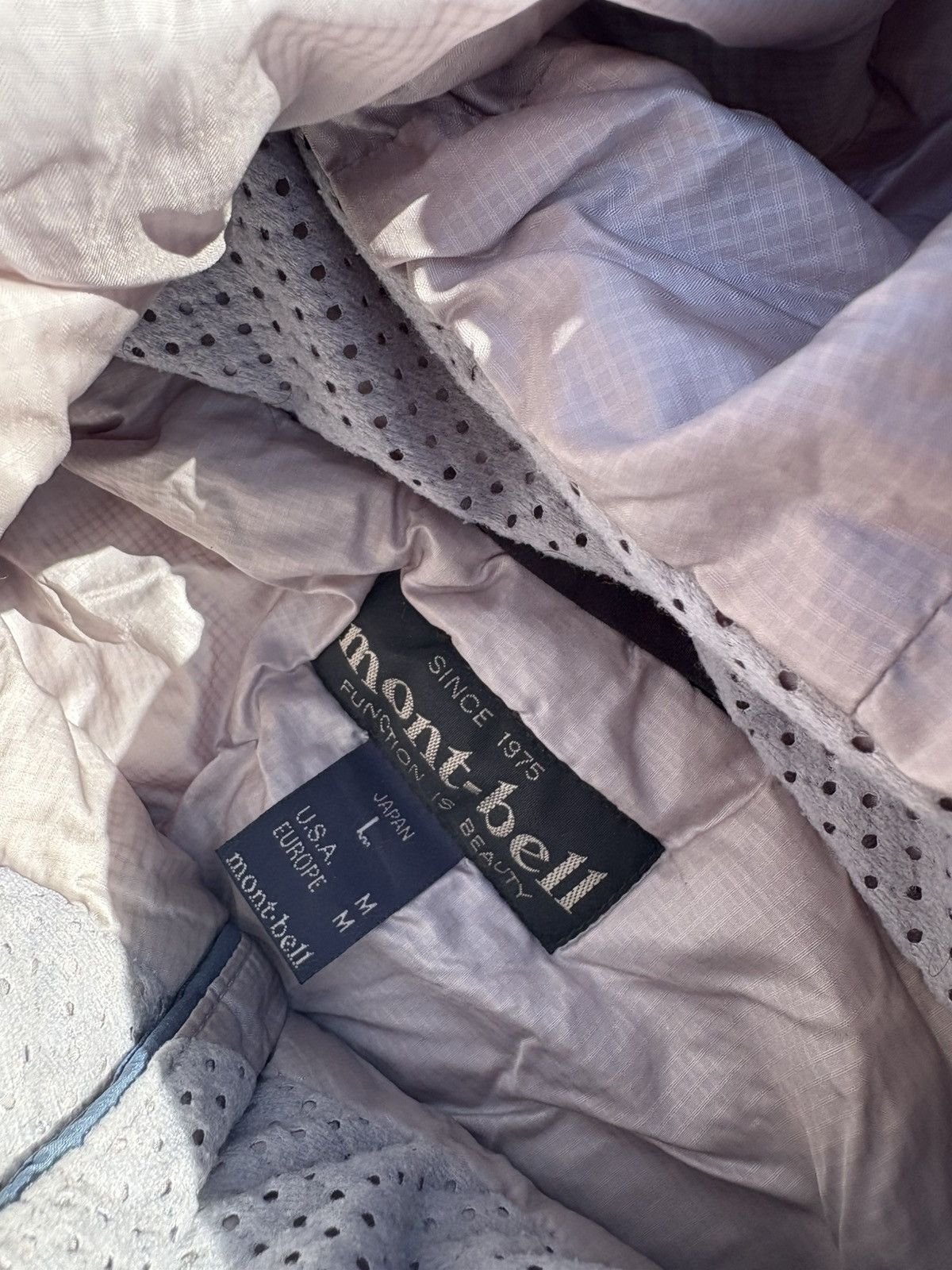 Montbell Puffer jacket Size US L / EU 52-54 / 3 - 4 Thumbnail