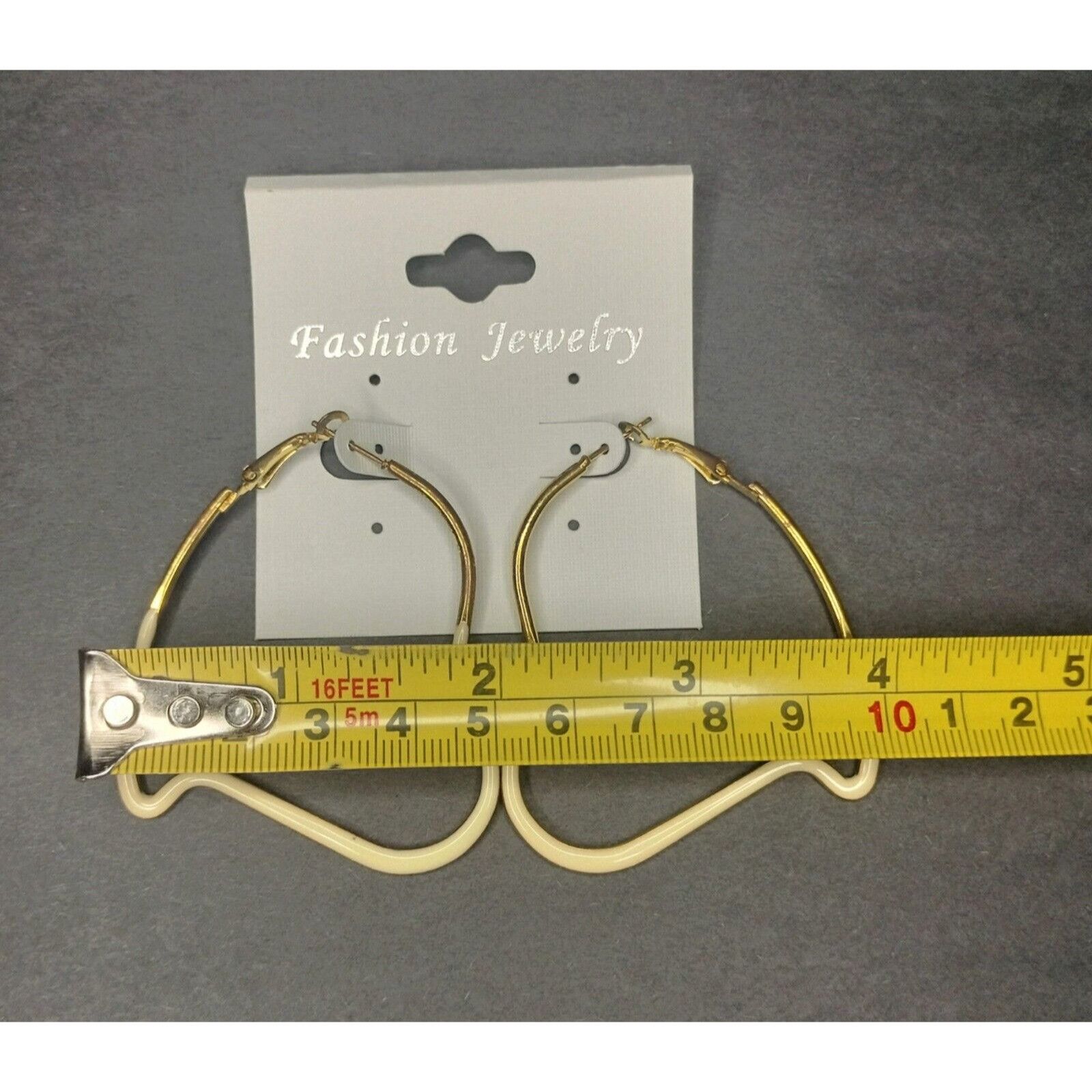 Other Hoop Earrings Fashion Jewelry Eggshell White Asymmetrical He Size ONE SIZE - 6 Thumbnail
