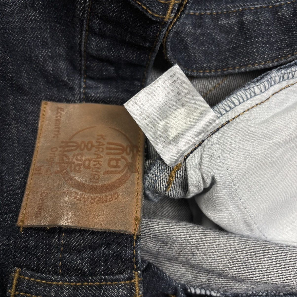 Karakuri Tamashii Rare Karakuri Tamashii multi pocket embroidery denim pants Size US 37 - 11 Thumbnail