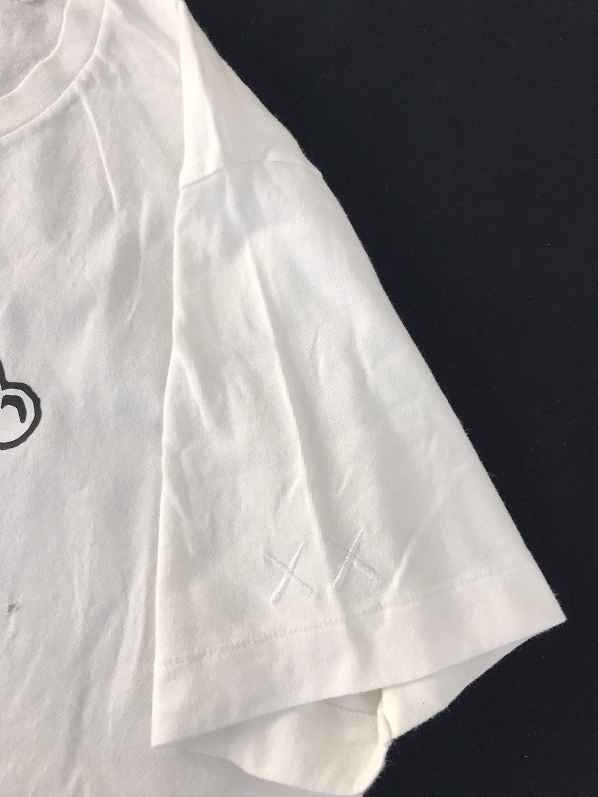Kaws × Peanuts Kaws X Peanuts Skating Snoopy Big Printed Tee Size US M / EU 48-50 / 2 - 14 Thumbnail