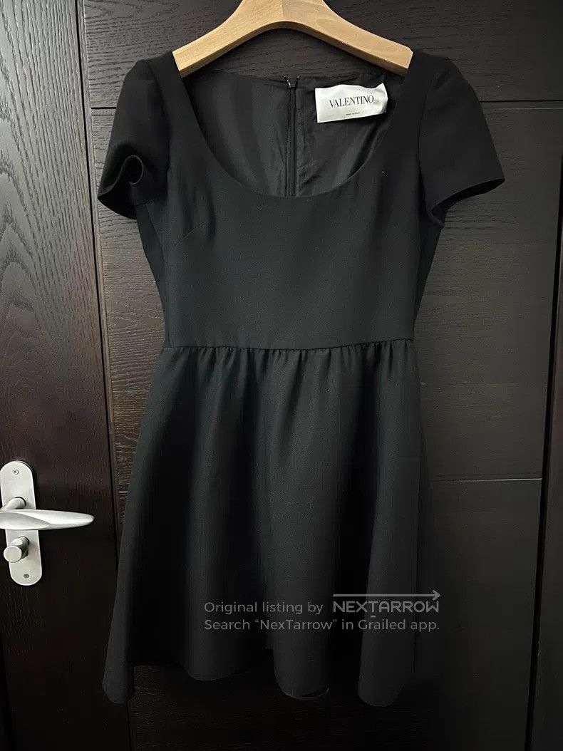 Valentino Silk wool dress at the hem of the bud