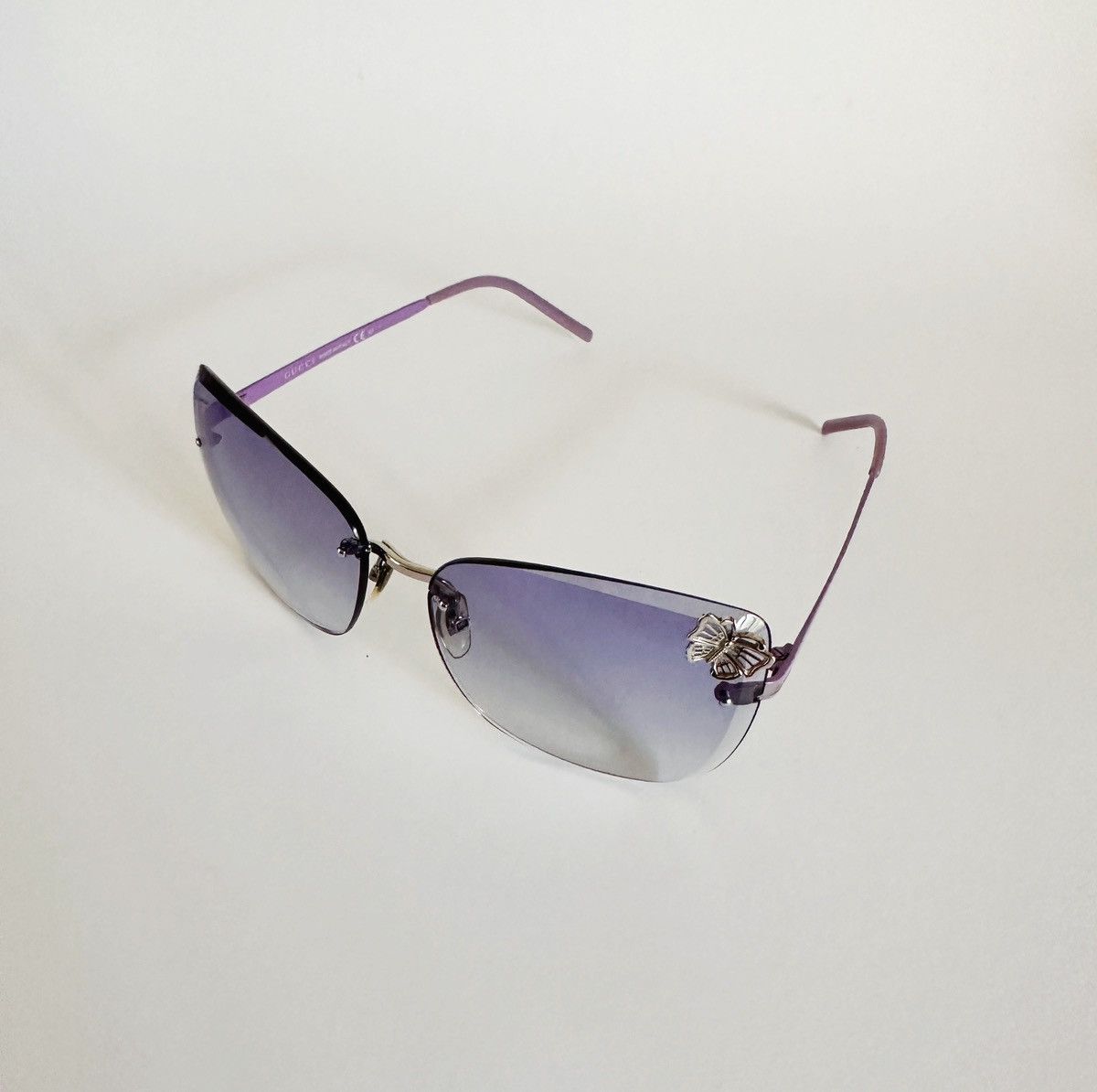 image of Gucci Flora “Butterfly” Rimless Sunglasses in Blue, Women's