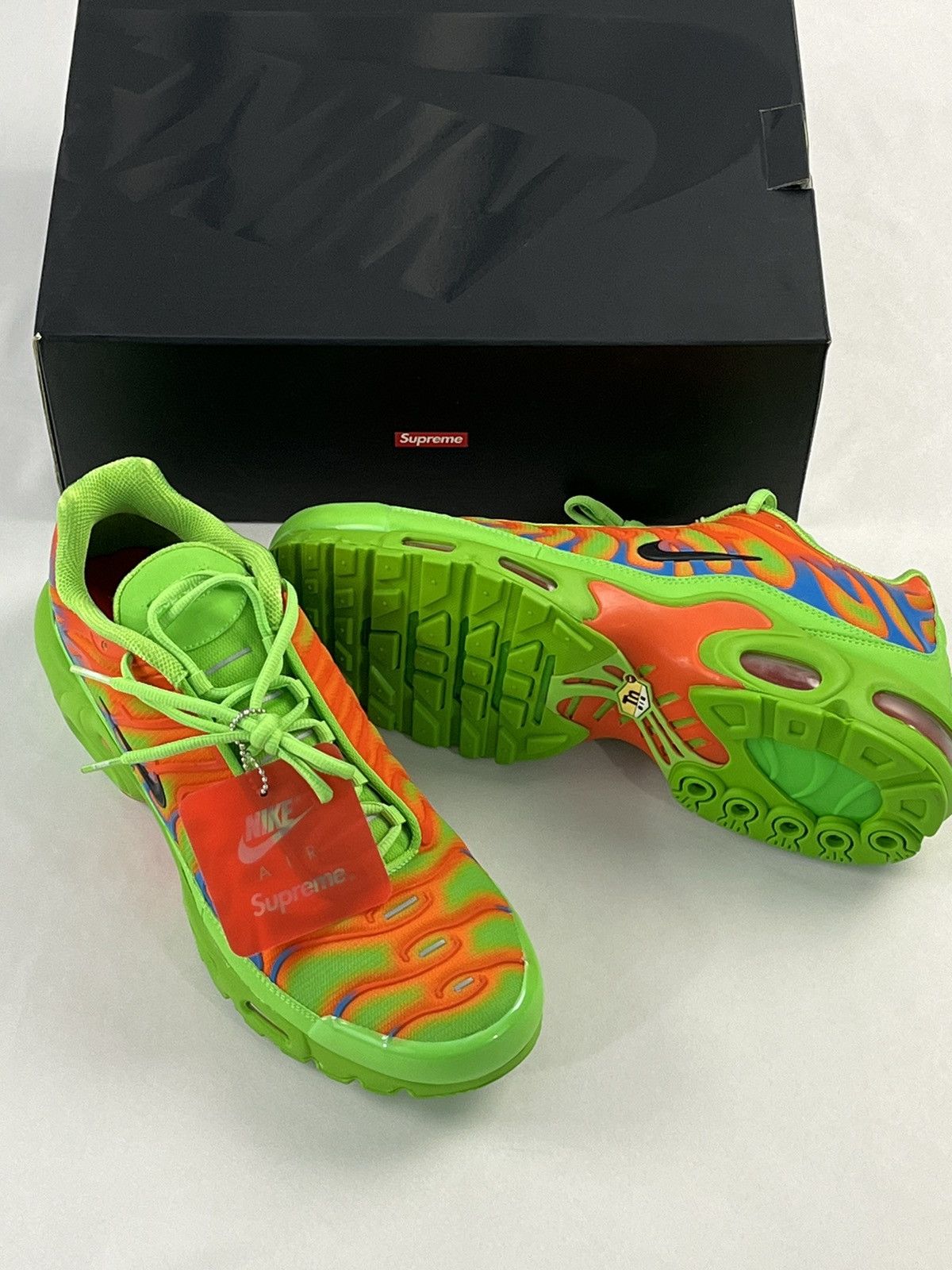 image of Nike Air Max Plus Tn Shoes in Green, Men's (Size 11.5)