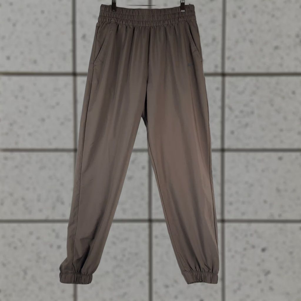 Nike Nike Dri-FIT Women’s Joggers Pants M Taupe Brown Lightweight Training Activewear Jogger Autumn Spring Winter Mens Womens Girls Boys Size 32" / US 10 / IT 46 - 1 Thumbnail
