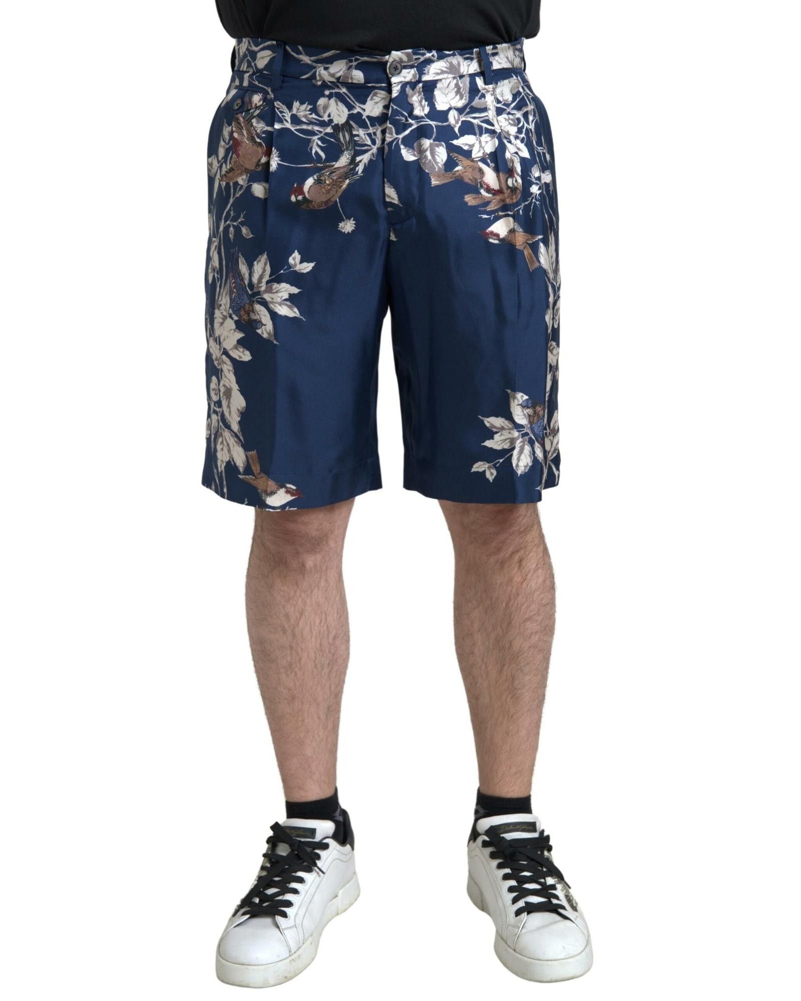 Image of Dolce Gabbana Floral Print Silk Bermuda Shorts in Blue, Men's (Size 30)