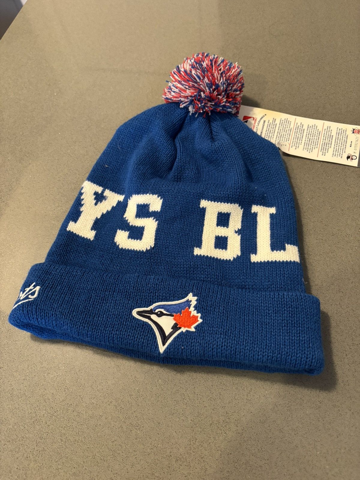 Roots Blue Jays Beanie Pom Pom Blue Roots Exclusive NEW Size ONE SIZE - 1 Thumbnail