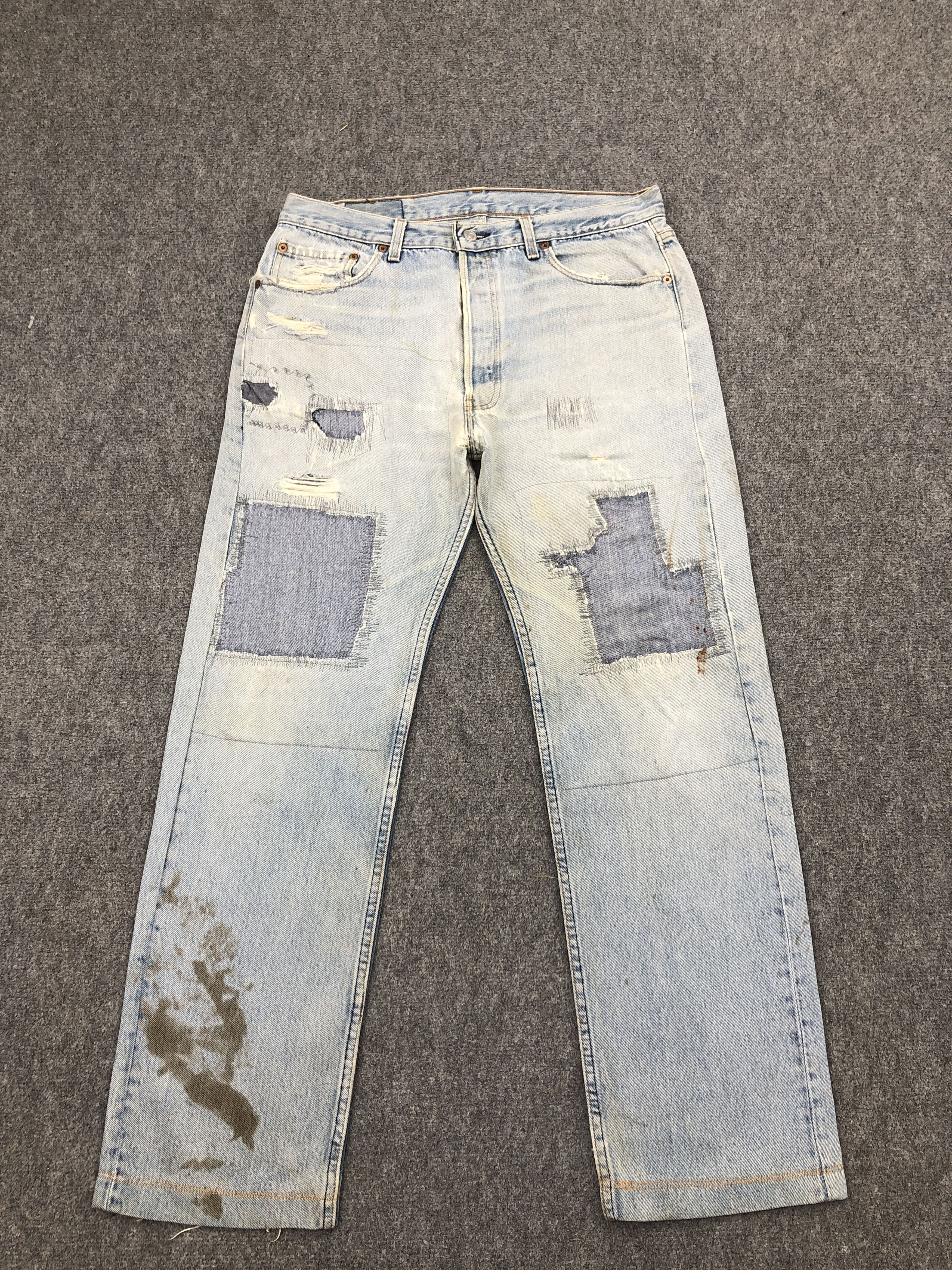 image of Distressed 90's Vintage Levis 501 Light Washed Dirty Jeans in Blue Denim, Men's (Size 34)