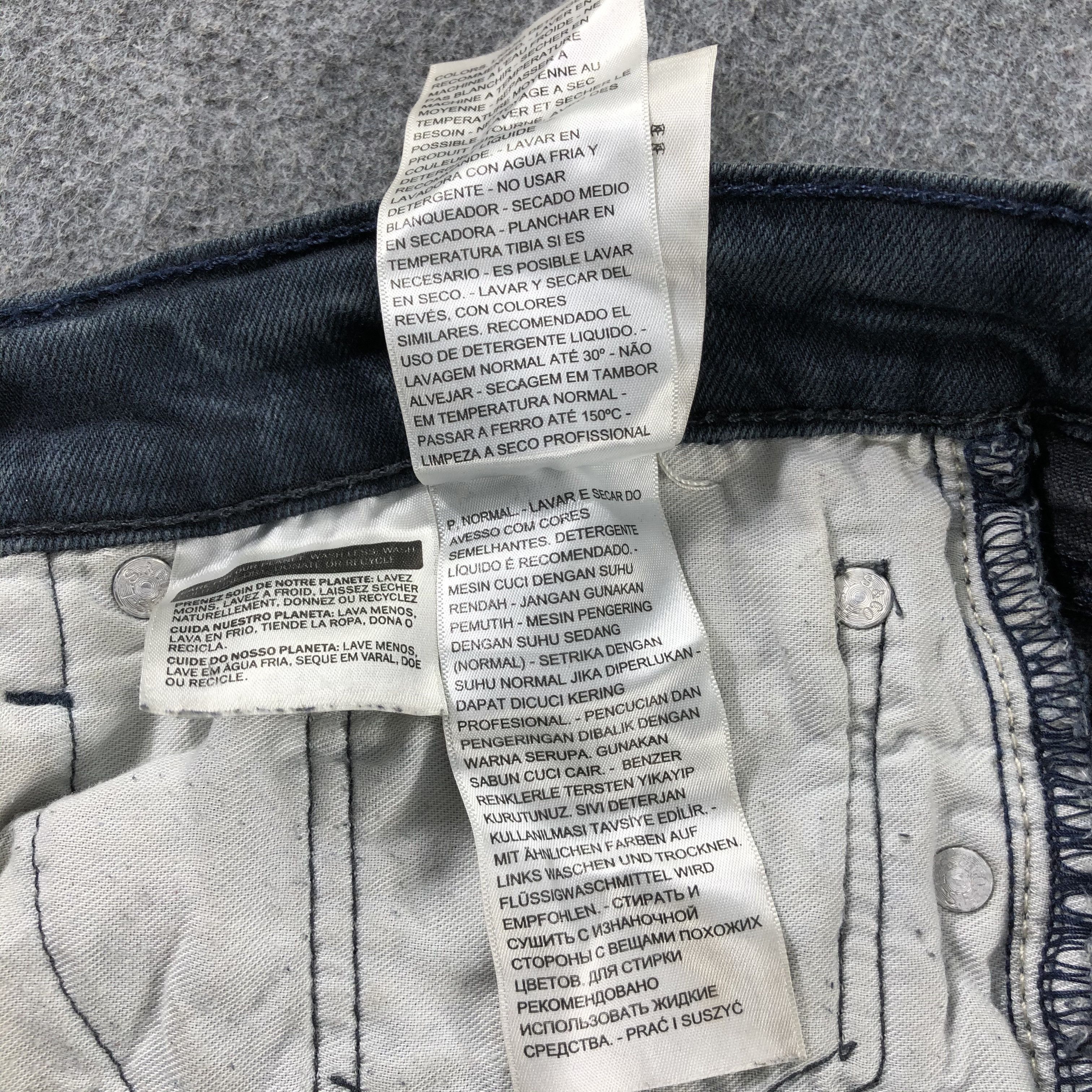 Vintage Faded Black Levis 513 Jeans-J2574