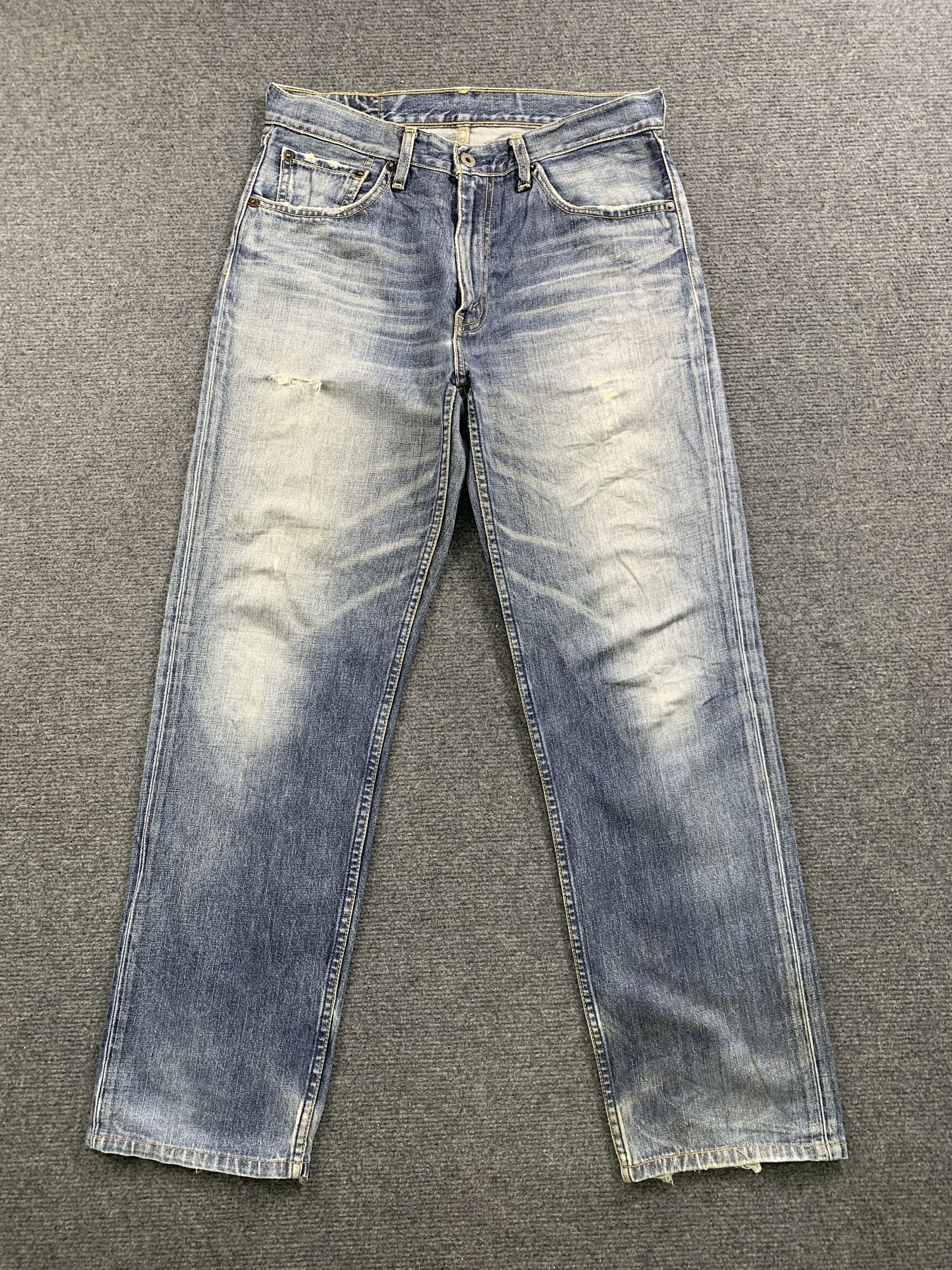 image of 90's Levis 502 Faded Blue Jeans 31X30 in Blue Denim, Men's