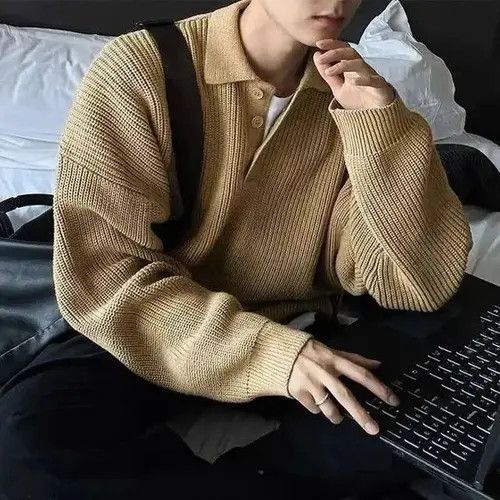Men's sweater with button fastening