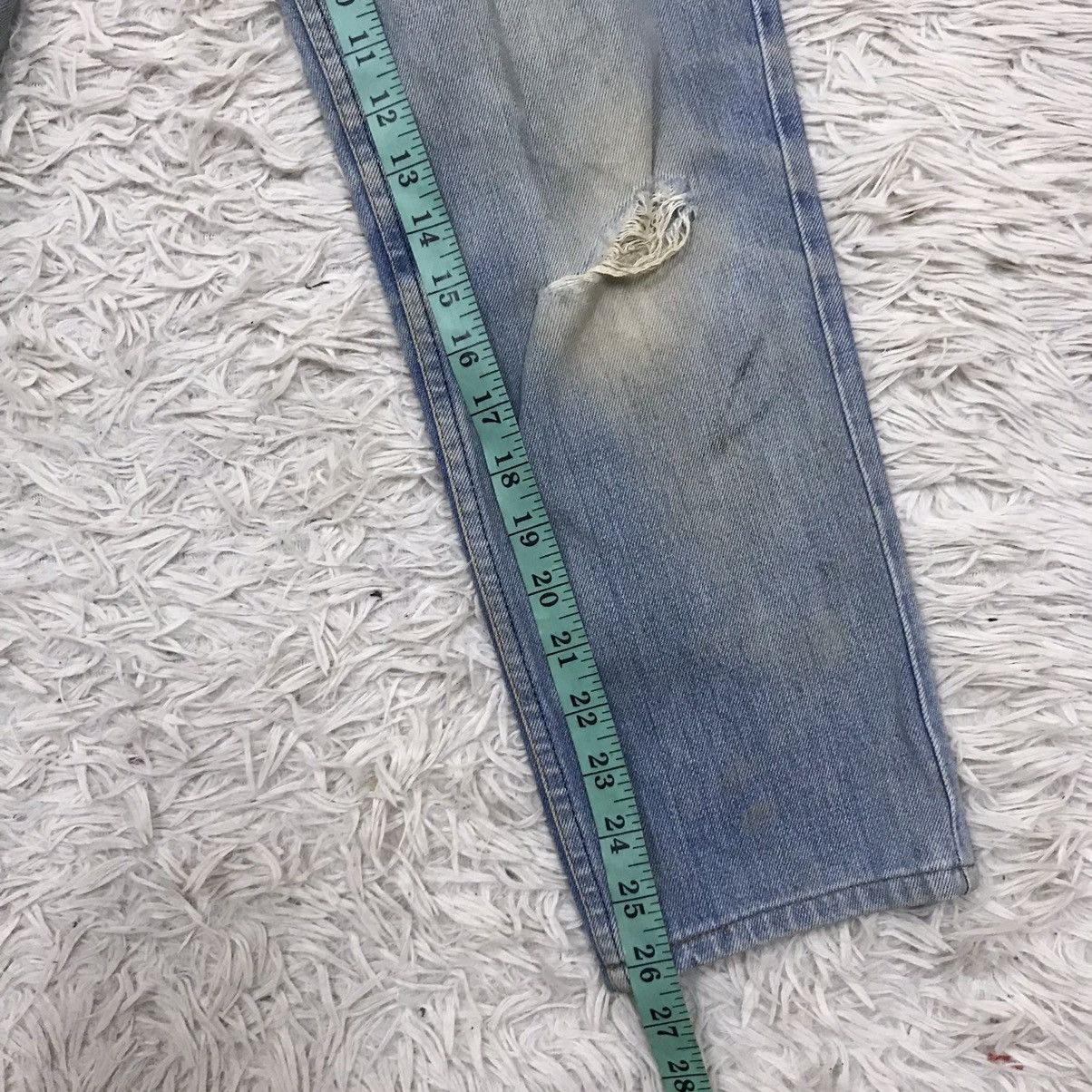 Vintage Levis Lot 506 Distressed Denim Jeans