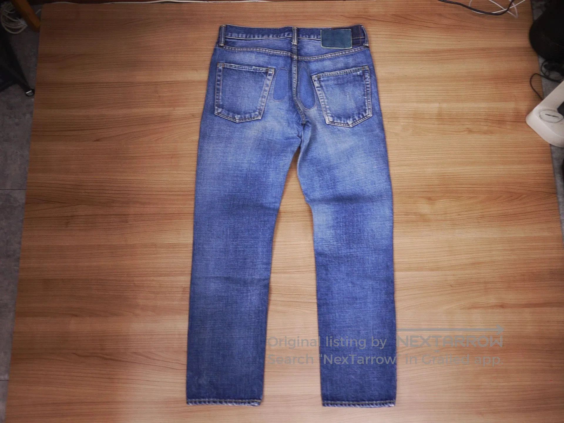 Blue Denim Jeans with Distressed Detail - Size 32.