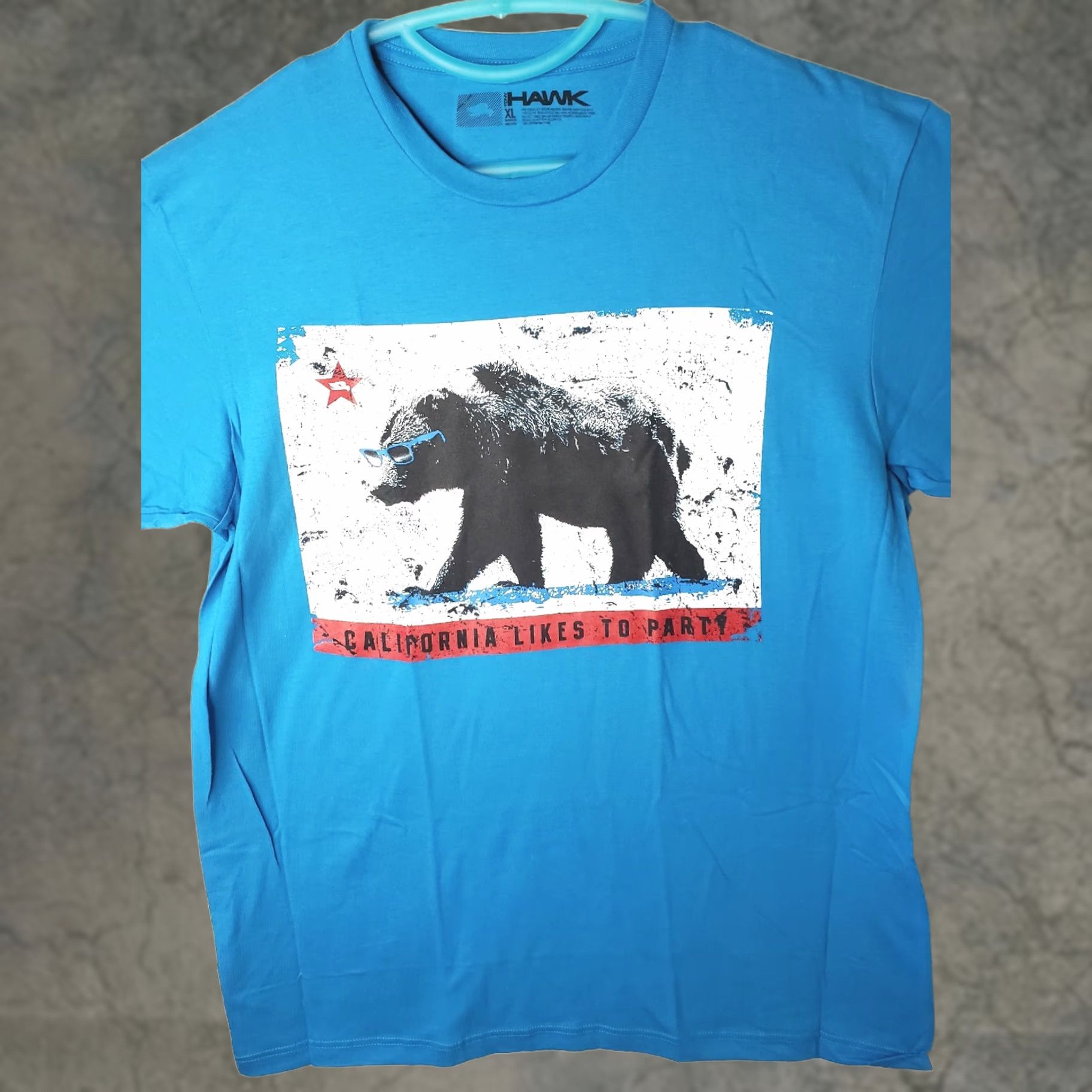 Vintage Tony Hawk T-Shirt Mens XL Blue Short Sleeve Crew Neck California Likes To Party Bear Logo Saying Graphic Print Jersey Solid Size US XL / EU 56 / 4 - 1 Thumbnail