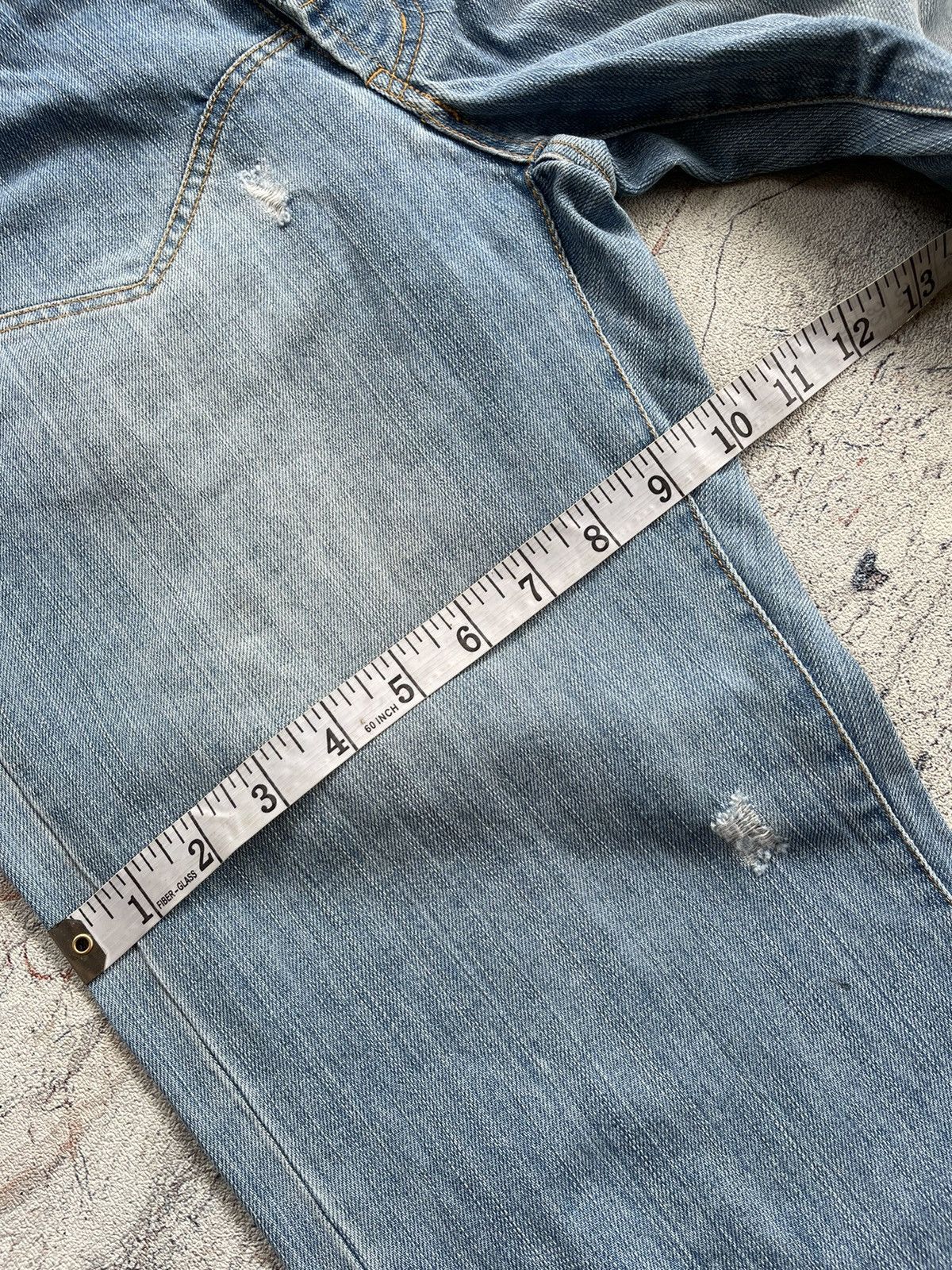 Sunao kuwahara distressed jeans by issey miyake