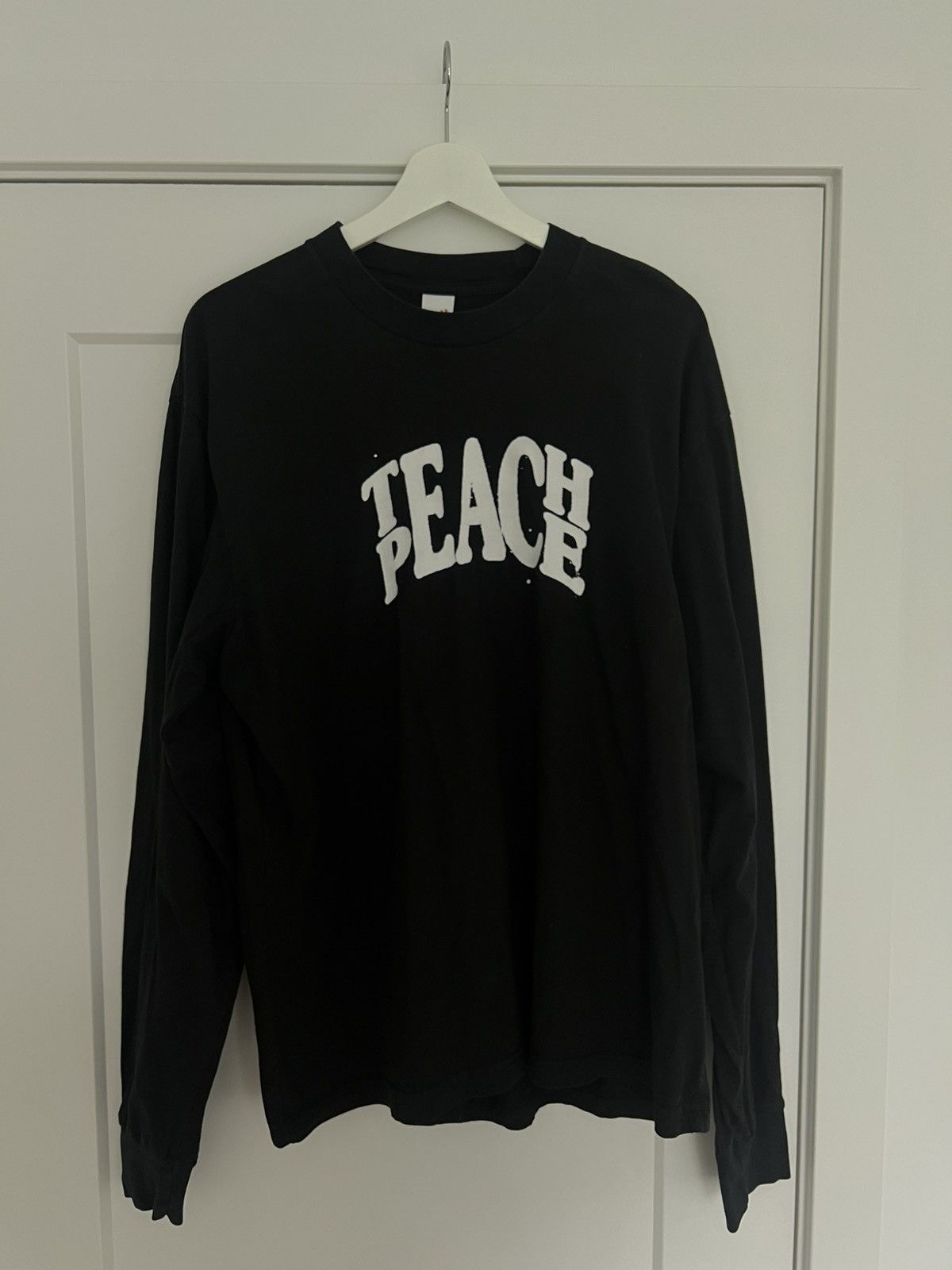 JJJJound Teach Peace Long Sleeve Tee in Black
