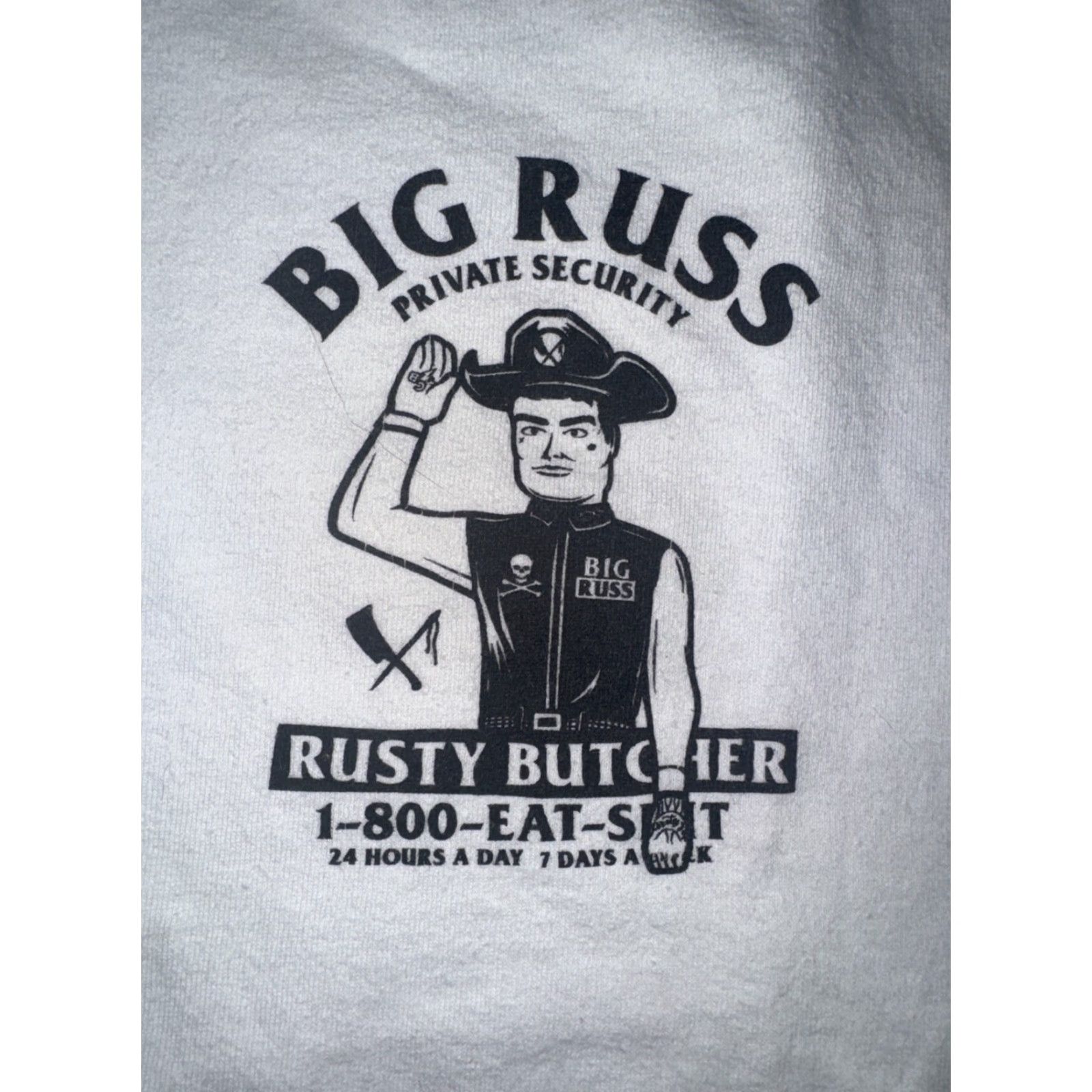 Rusty Rusty Butcher T-Shirt White Large 20x28 Motorcycle Mens Big Russ Private Security 1-800-EAT-SH*T Size US L / EU 52-54 / 3 - 5 Thumbnail