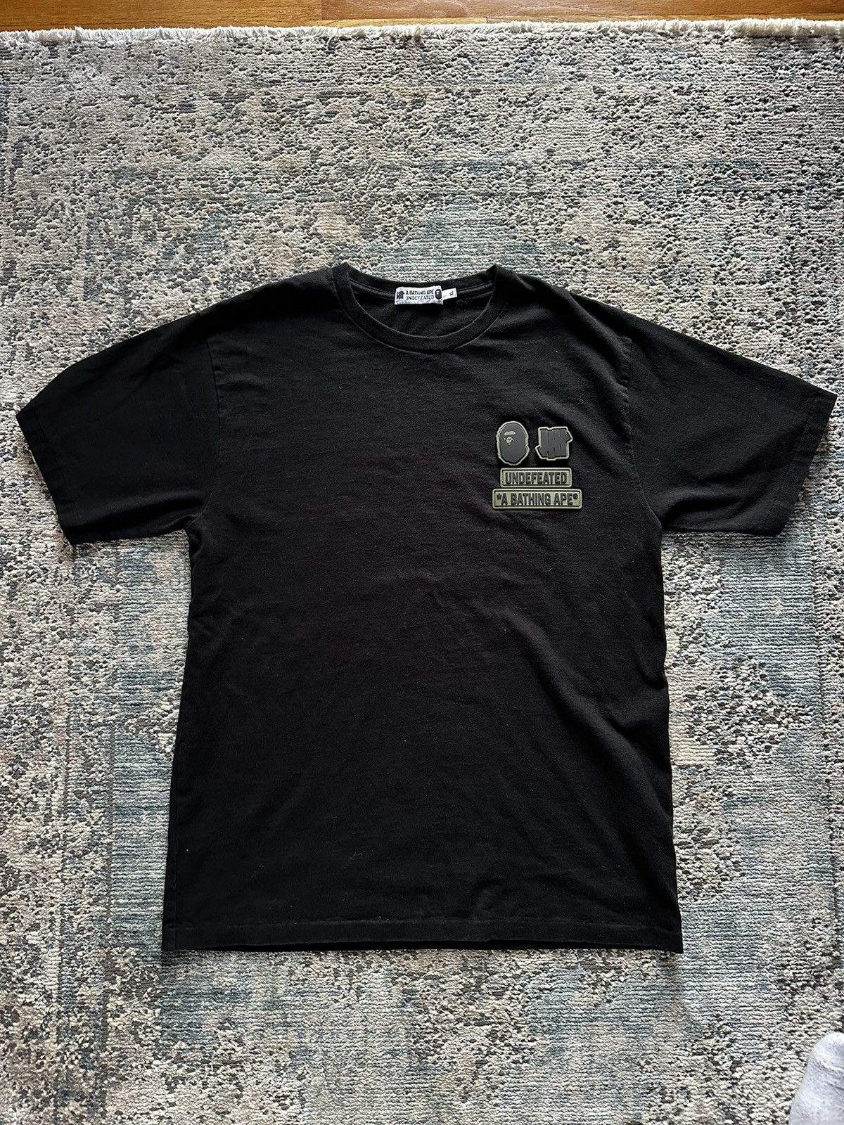 Bape x undefeated black tee best sale