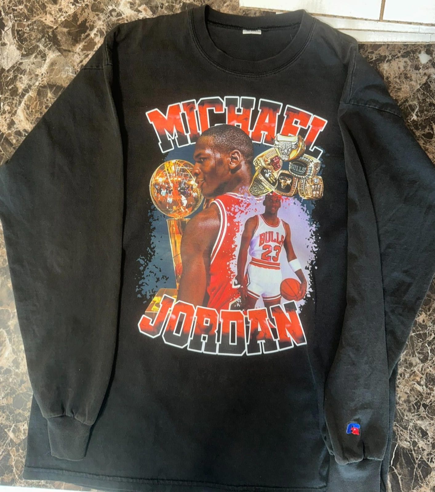 Russell Athletic GOAT Tribute Shirt L – MJ Rings & Trophy Graphic, Black Size US L / EU 52-54 / 3 - 4 Thumbnail