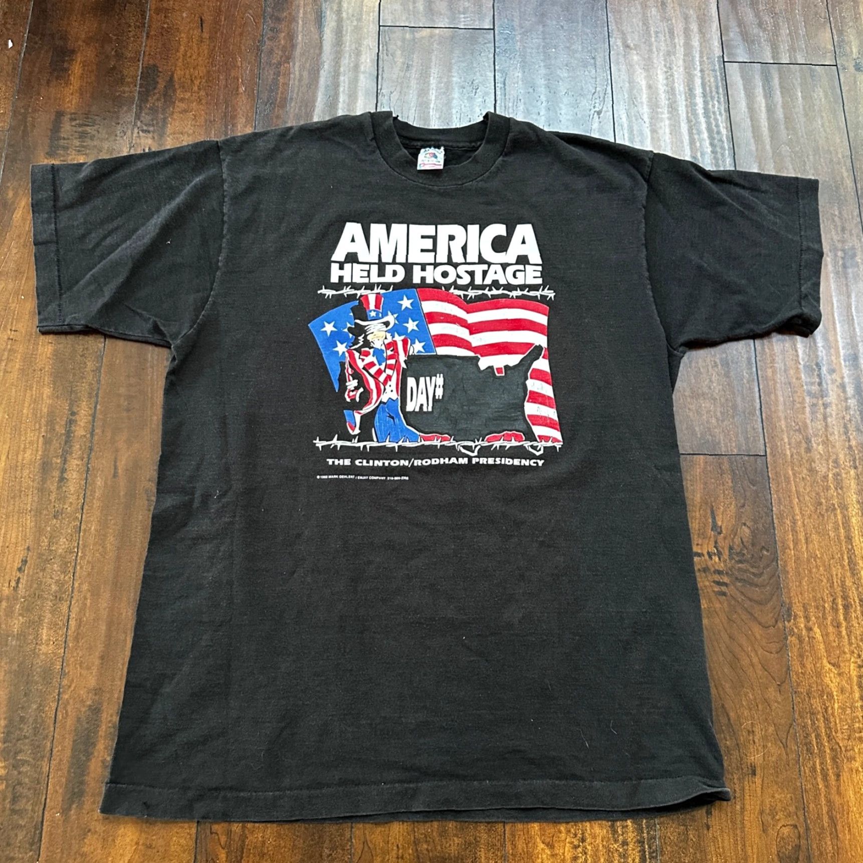 Fruit Of The Loom VINTAGE Fruit of the Loom T-Shirt Shirt XL Black America Held Hostage USA VTG 70s 80s 90s Political Funny Mens Size US XL / EU 56 / 4 - 6 Thumbnail